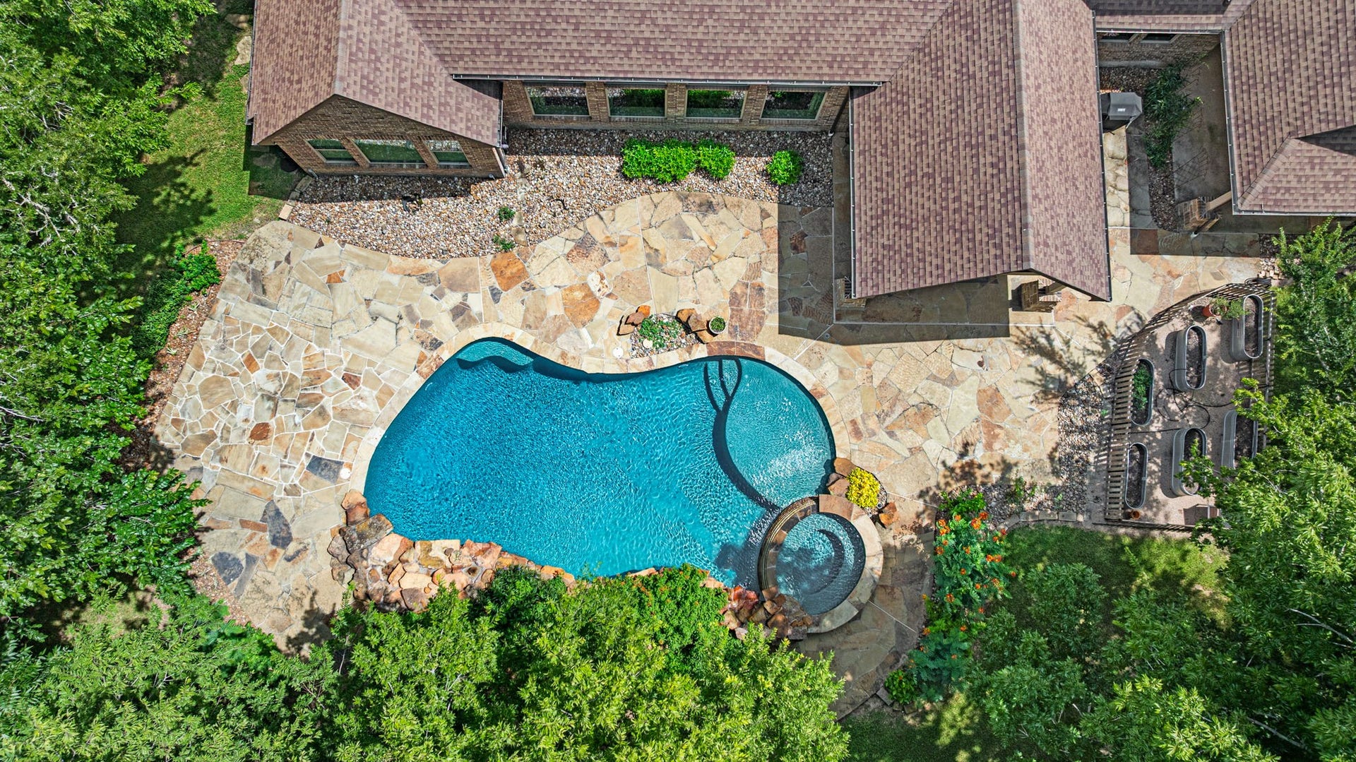 2734 Forest View, Richmond, TX 77406 Aerial of pool and decking. Quite simply a place to unwind, decompress and enjoy family, friends or some solitude. Escape the Houston heat in your very own tropical resort.