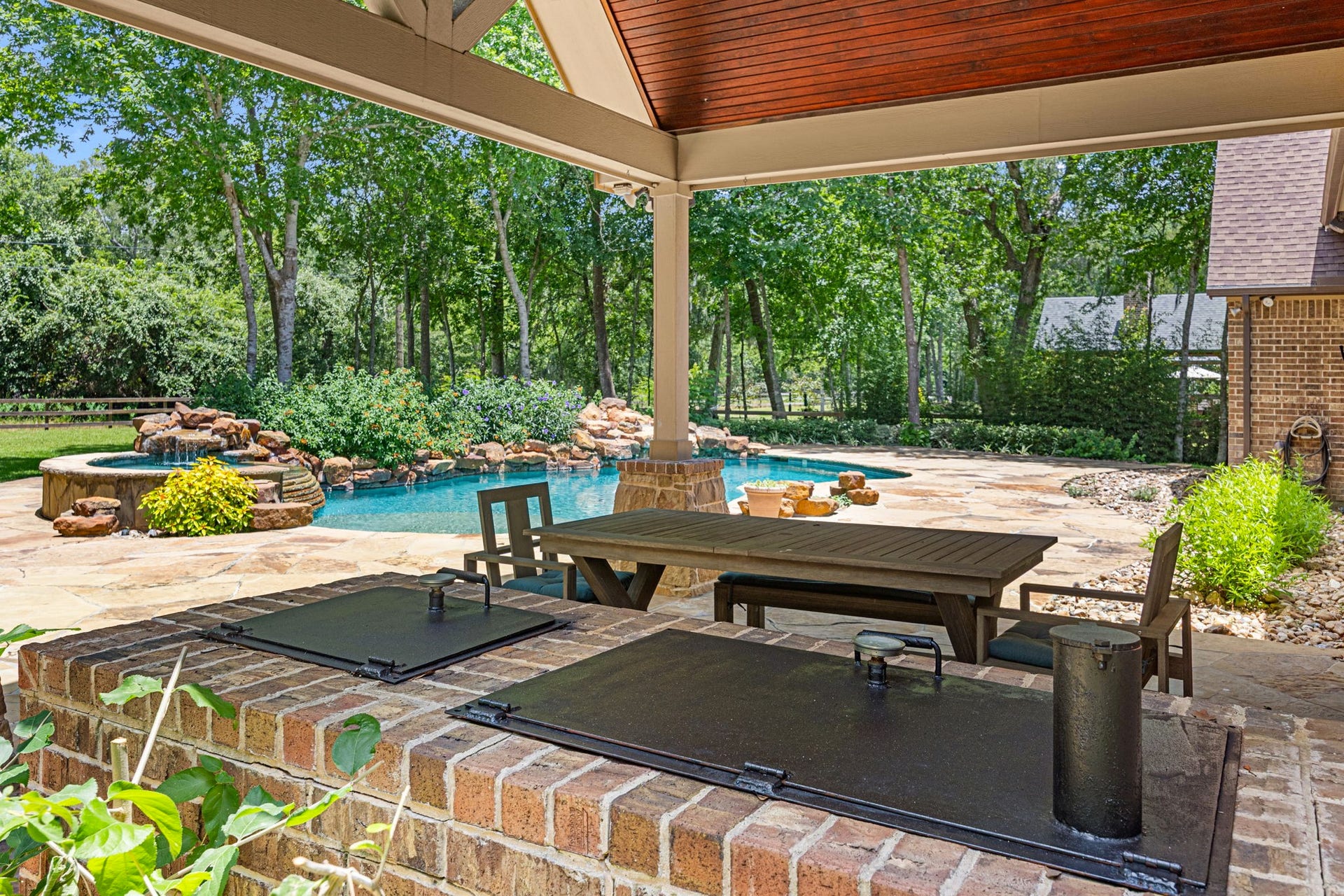 2734 Forest View, Richmond, TX 77406 Covered patio, smoker pits and lots of sunshine.