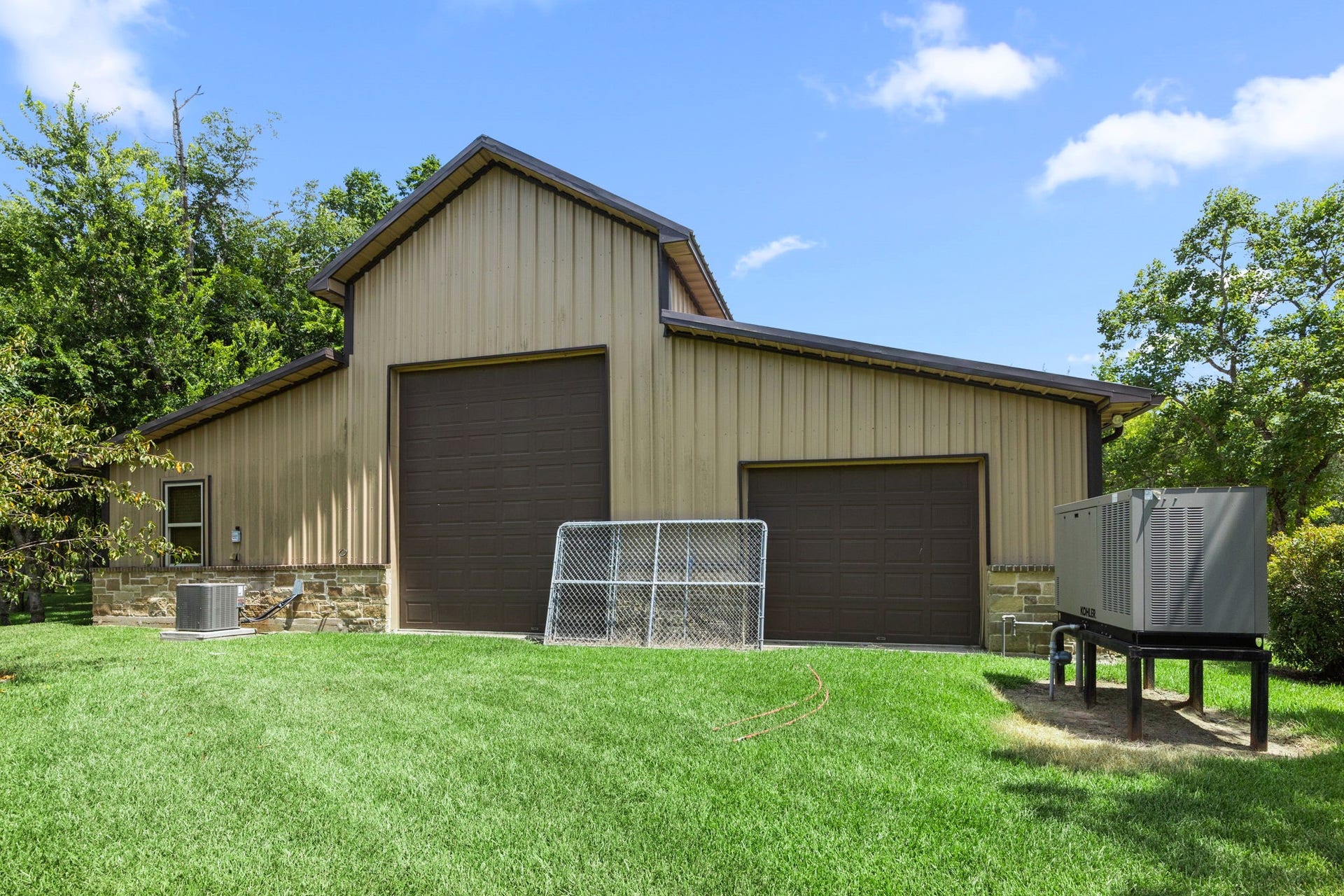 2734 Forest View, Richmond, TX 77406 Back of the auxiliary building. Property has a 30KW Kohler generator for energy security power by natural gas.