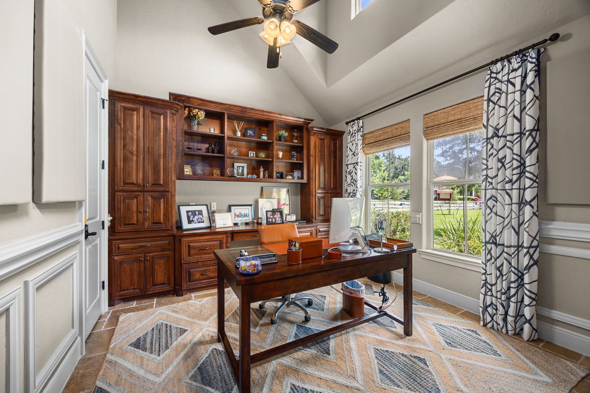 2734 Forest View, Richmond, TX 77406 The office/study has built in shelving and cabinets. Abundant natural light and pretty outdoor views.