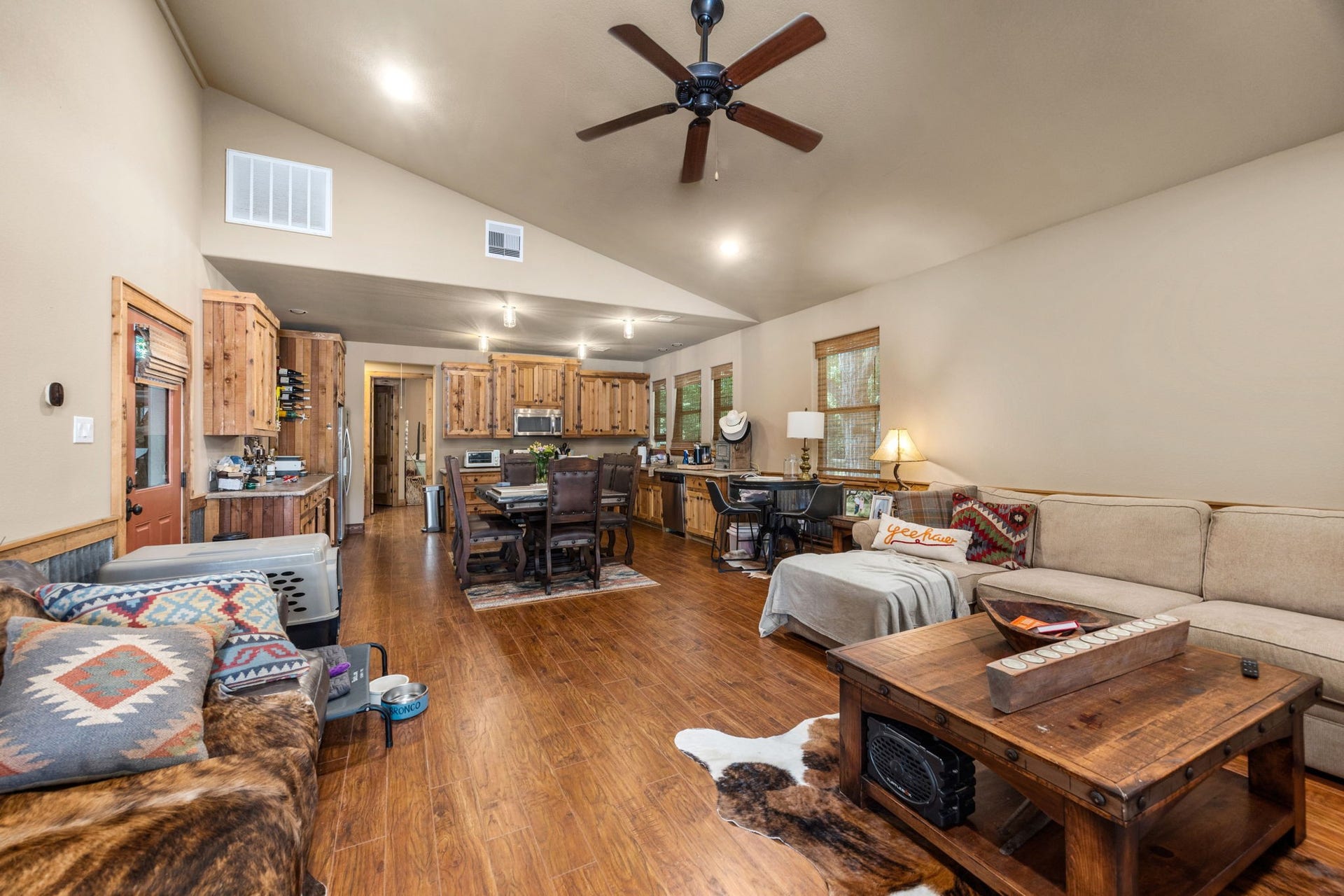 2734 Forest View, Richmond, TX 77406 Inside the 1,080 SF living quarters on the right side of the auxilary building. Perfect for guests, kids parties, the little league team, etc. Door to the left lead to RV storage/workshop.