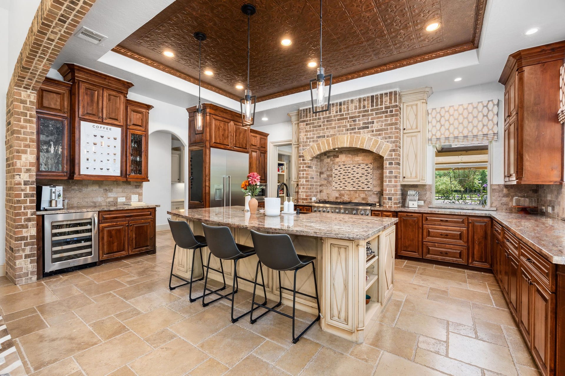 2734 Forest View, Richmond, TX 77406 Check out the stamped metal ceiling, wine cooler, exquisite cabinetry, lighting and granite.