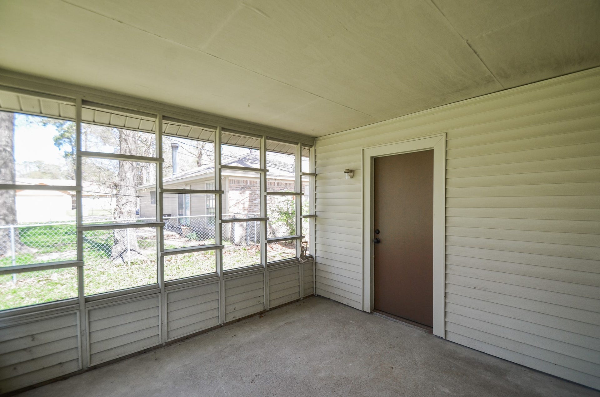 123 Cypress Lane, Conroe, TX 77301 enclosed porch is comes in helpful