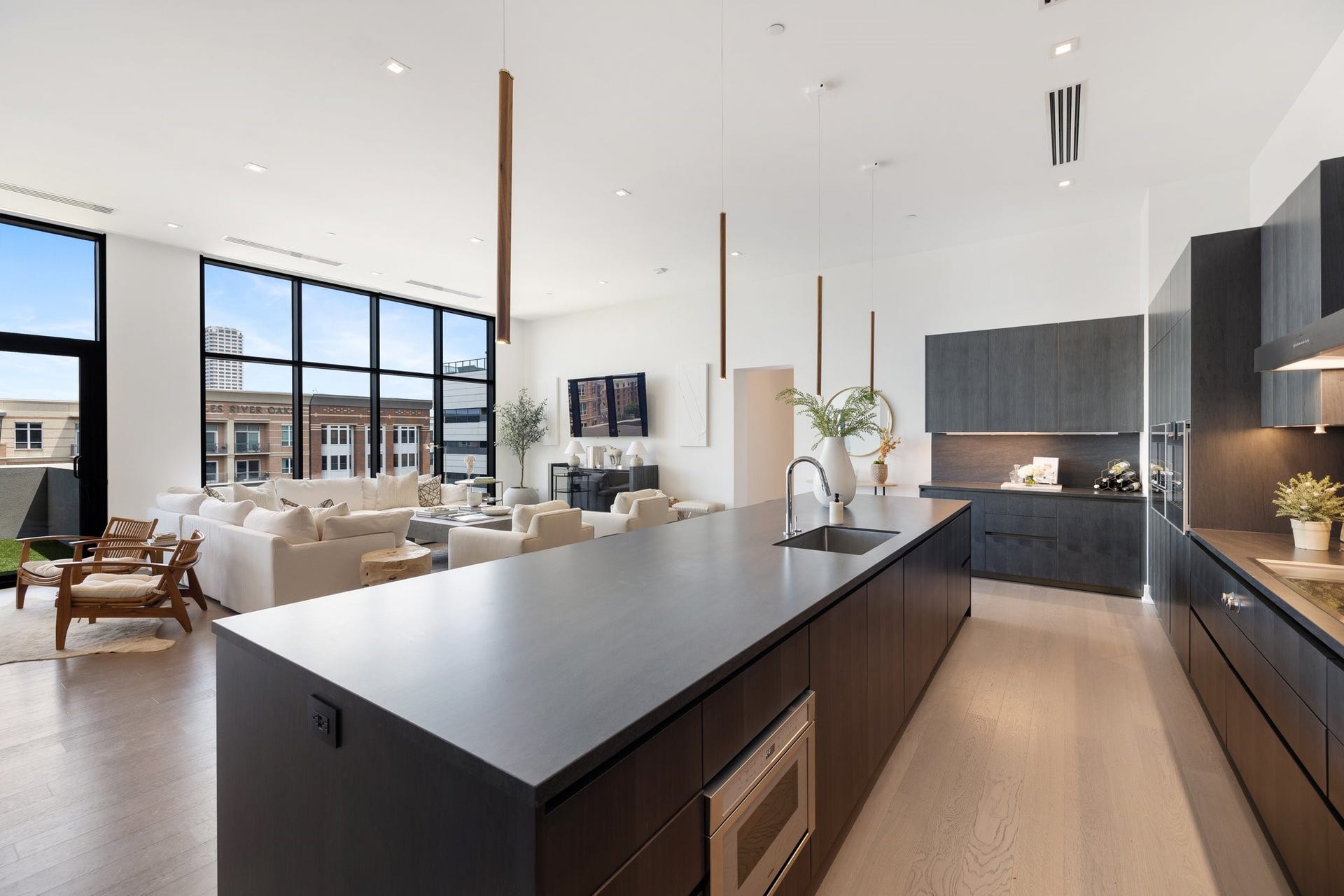 2710 Steel Street, #704, Houston, TX 77098 Seamless living with kitchen open to living space.