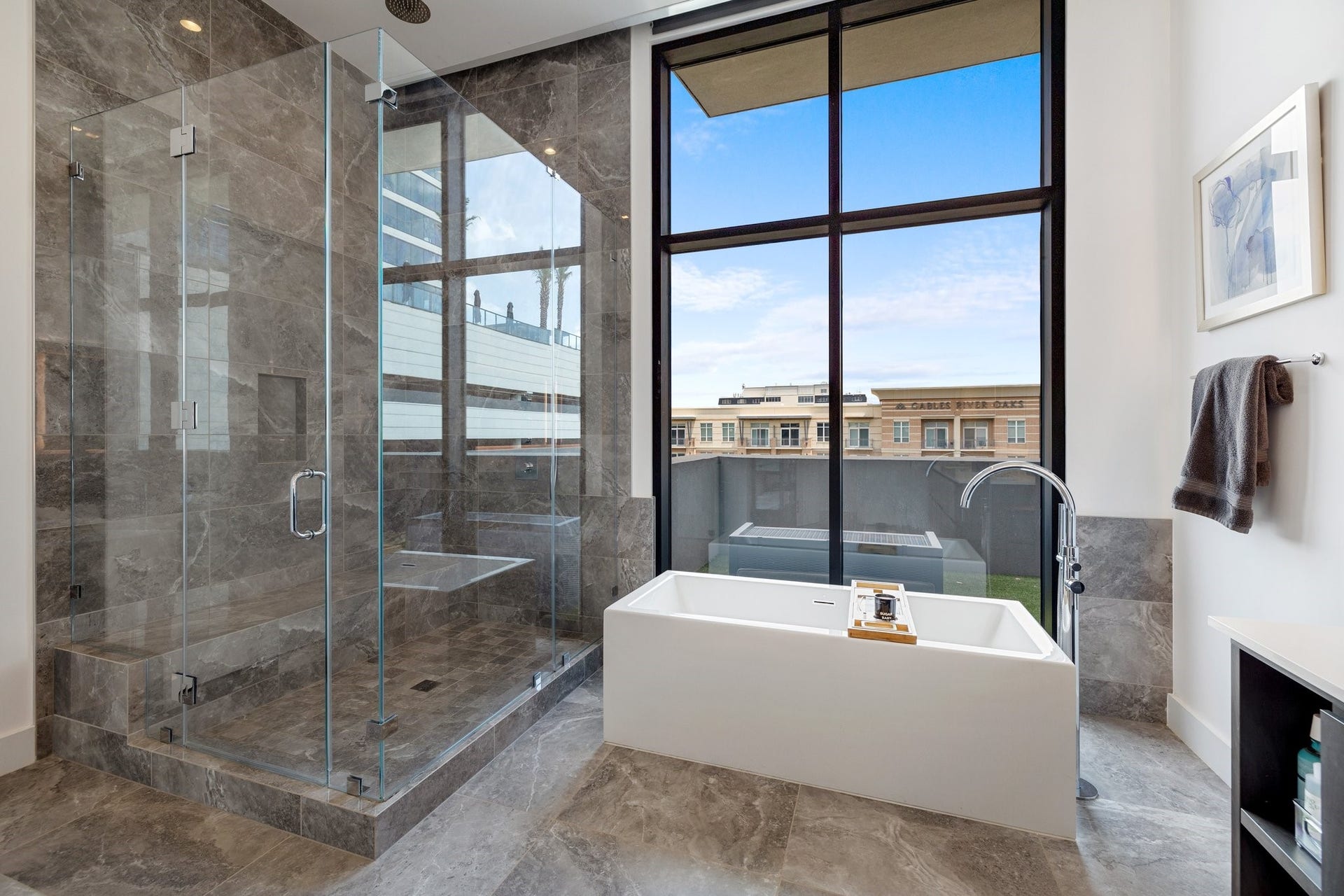 2710 Steel Street, #704, Houston, TX 77098 View of the glass enclosed shower, and tub.
