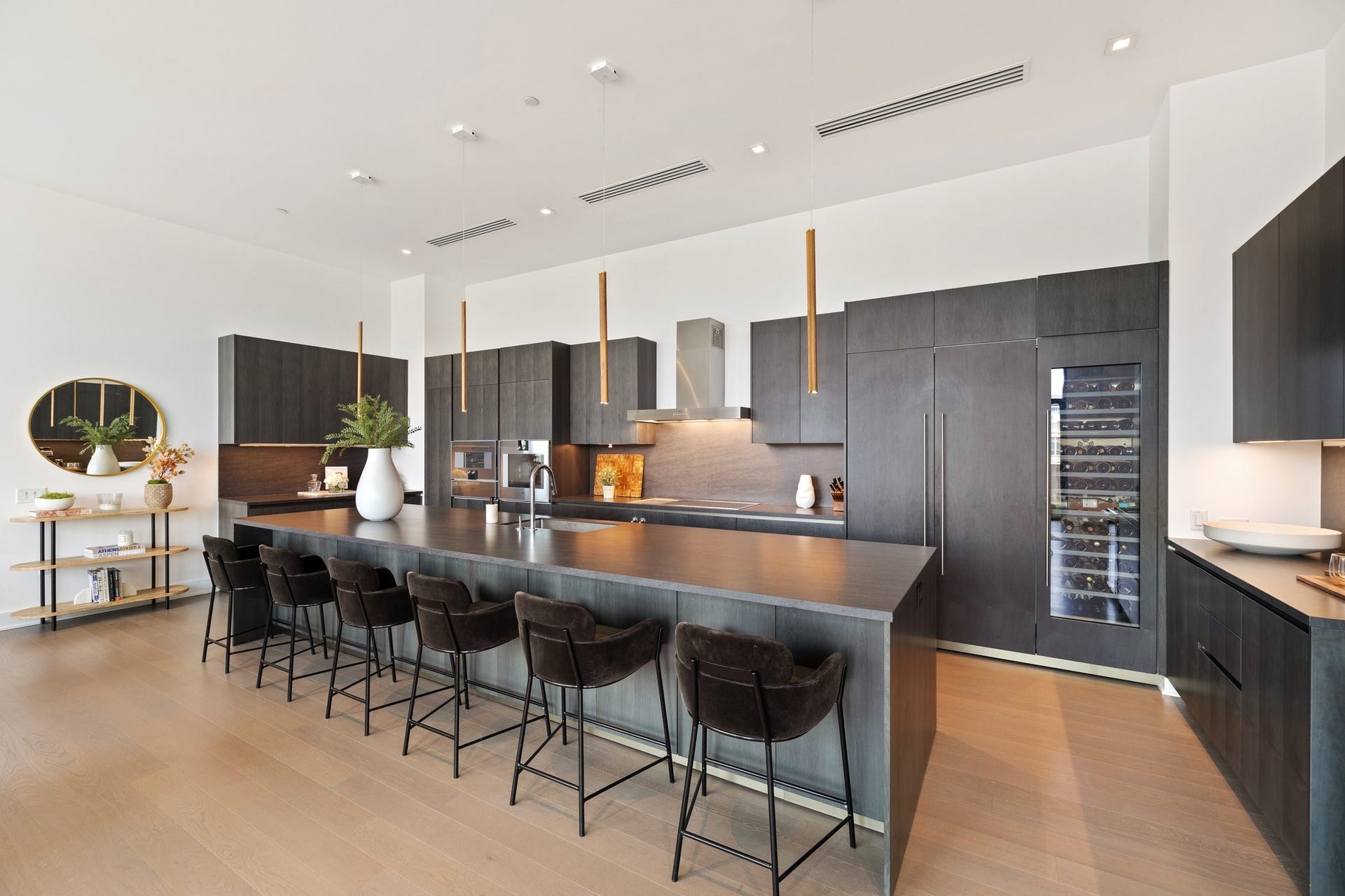 2710 Steel Street, #704, Houston, TX 77098 Giorgetti kitchen complete with waterfall kitchen island, Gaggenau appliances & endless storage space.