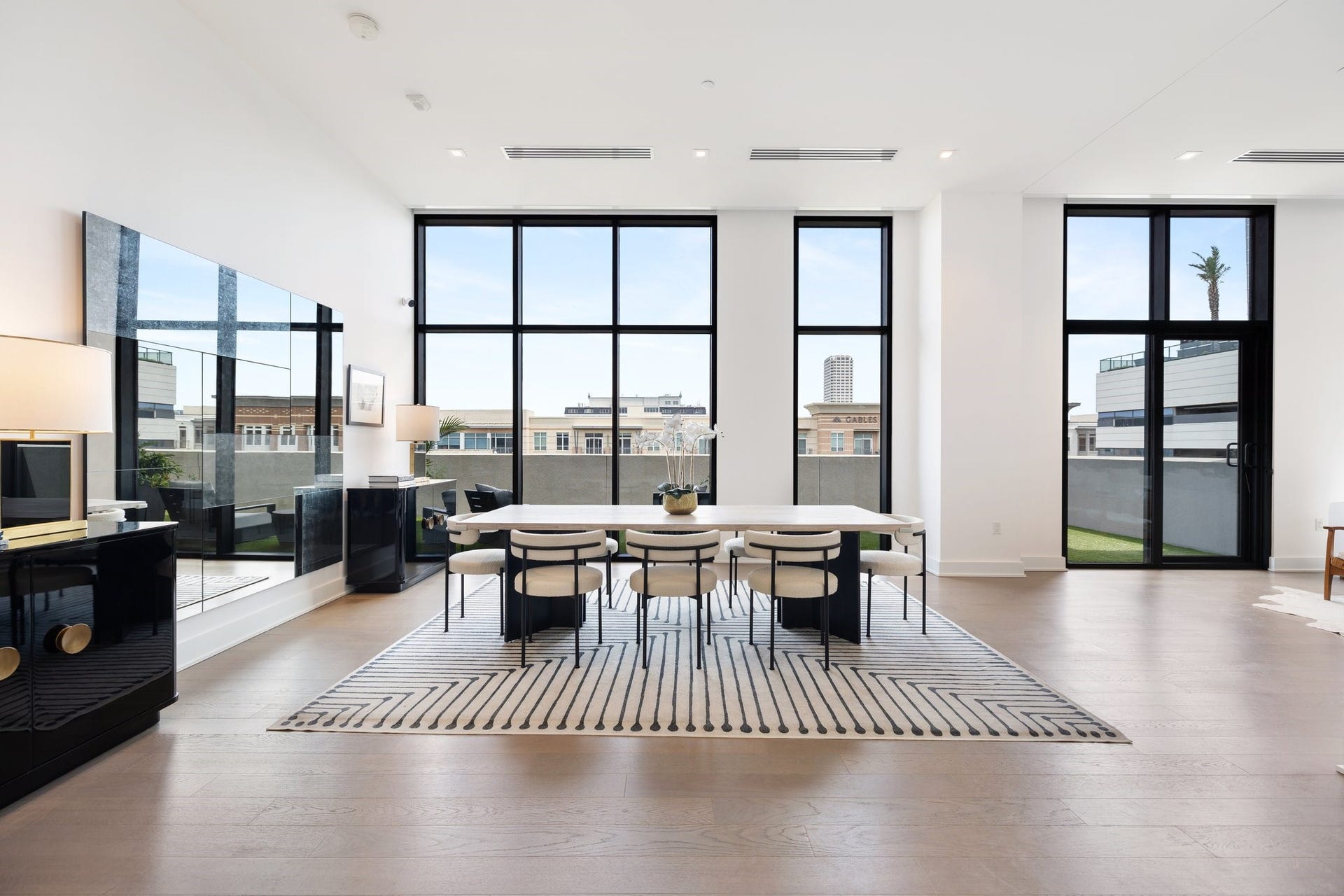 2710 Steel Street, #704, Houston, TX 77098 The large dining area is open to living area, with access to turfed terrace.