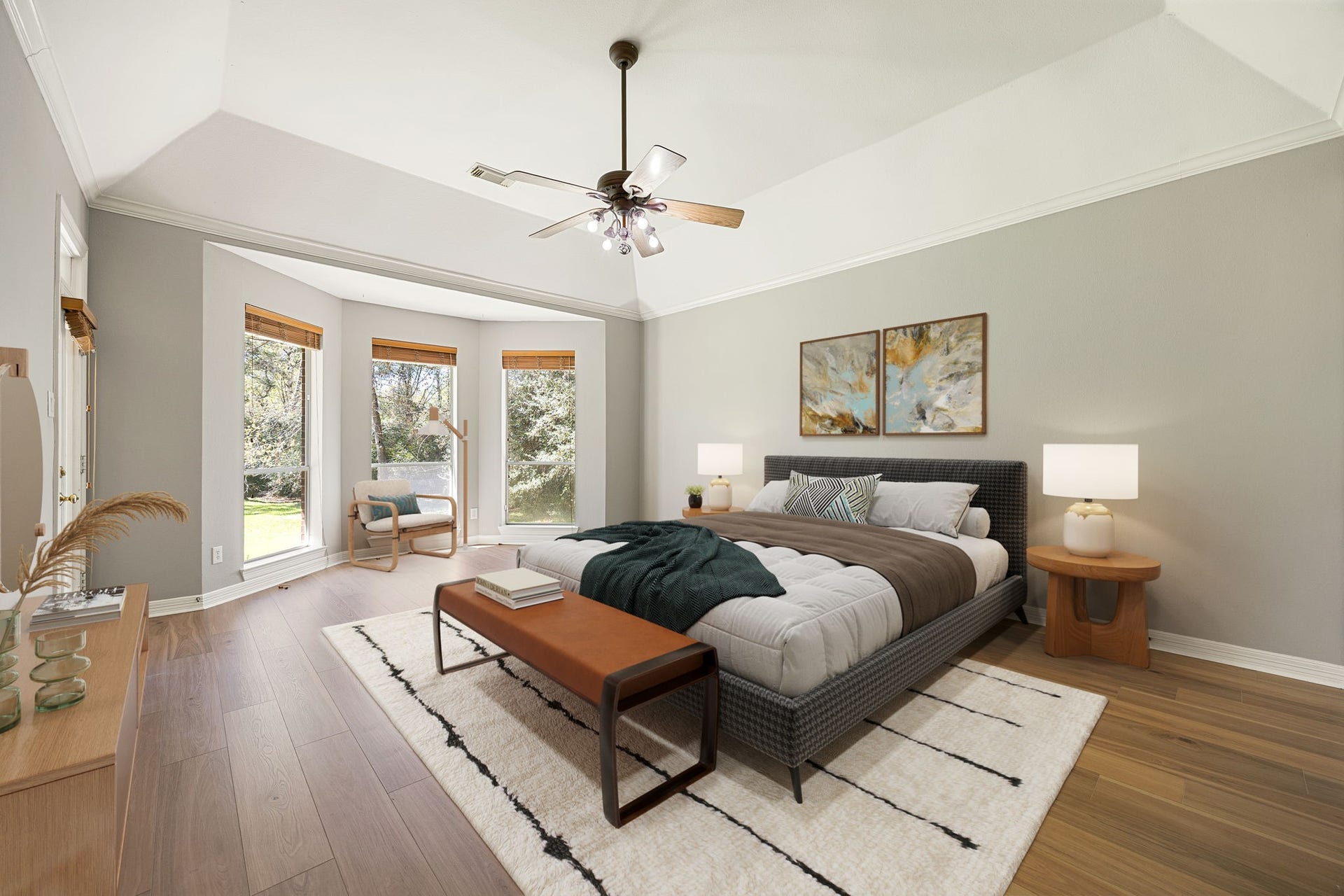 Beautiful primary suite with high ceilings, abundant natural light, and space for a sitting area. Designed for comfort and privacy, this room offers the perfect place to unwind at the end of the day. *virtually staged*