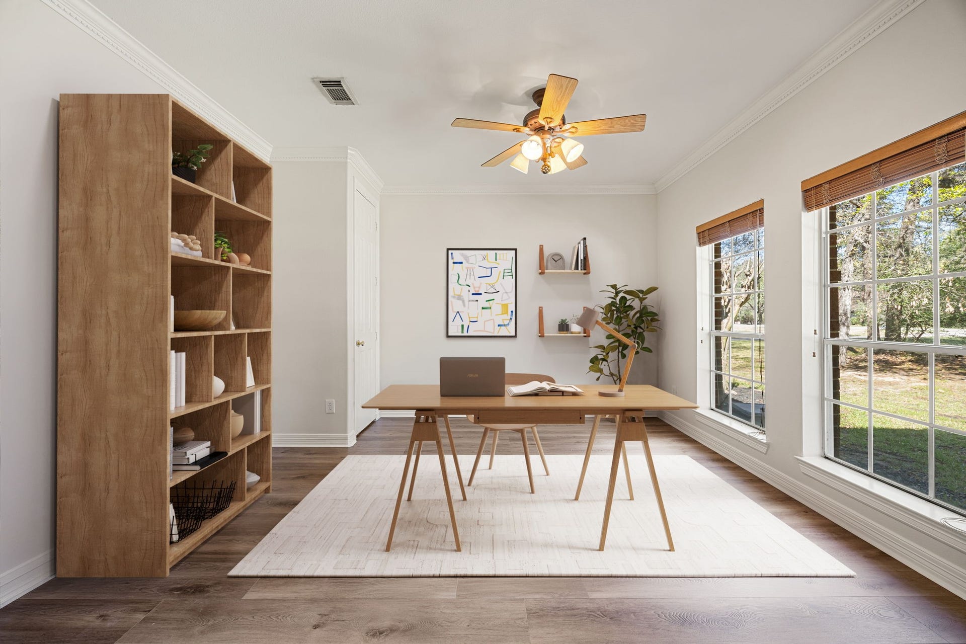 Bright and spacious study with large windows and elegant trim, perfect for a home office, library, or flex space to fit your needs. *virtually staged*