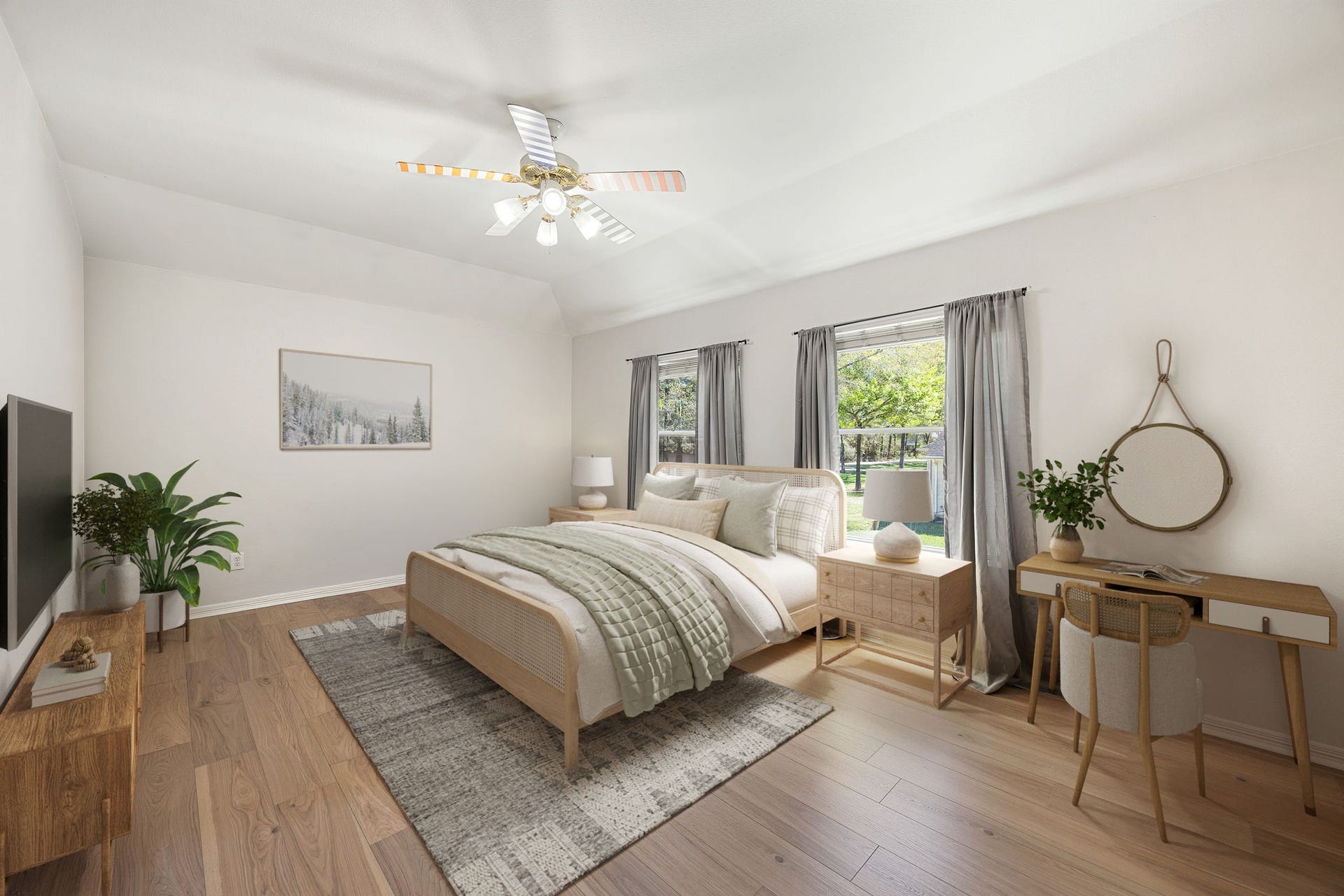 Enjoy this spacious bedroom with vaulted ceiling, big windows, and plenty of room for furniture and storage. *virtually staged*
