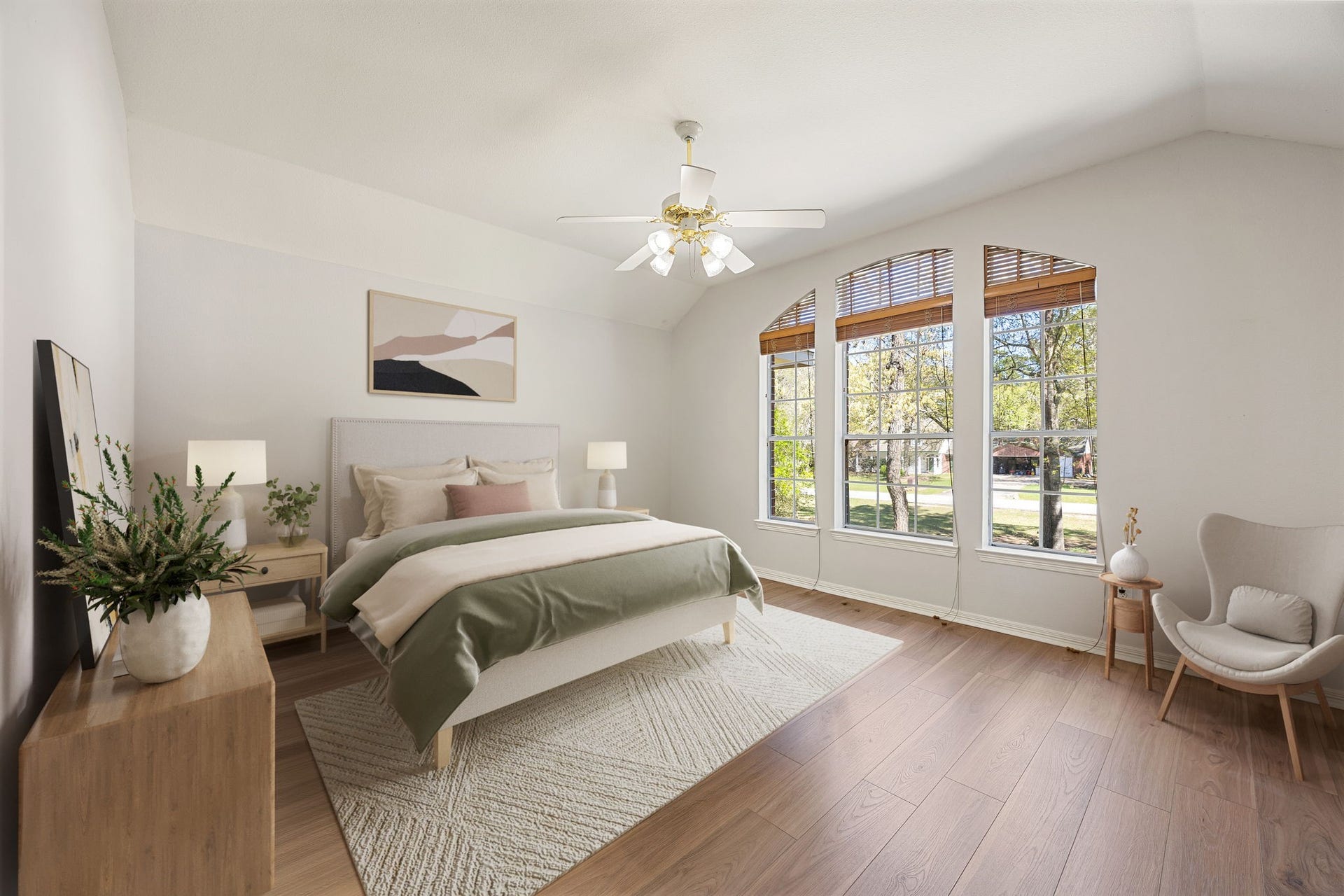 Enjoy this roomy bedroom with vaulted ceilings, big windows, and a bright open feel perfect for family or guests. *virtually staged*