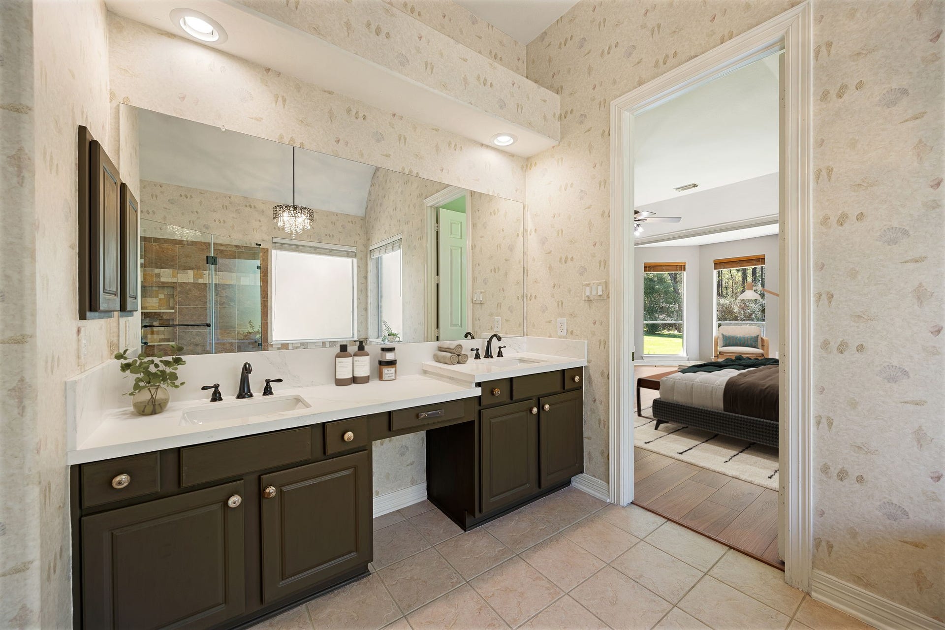 Spacious primary bathroom featuring double sinks, a large vanity with plenty of storage, and a separate shower. Designed for comfort and functionality, this bathroom offers the perfect space for everyday living.