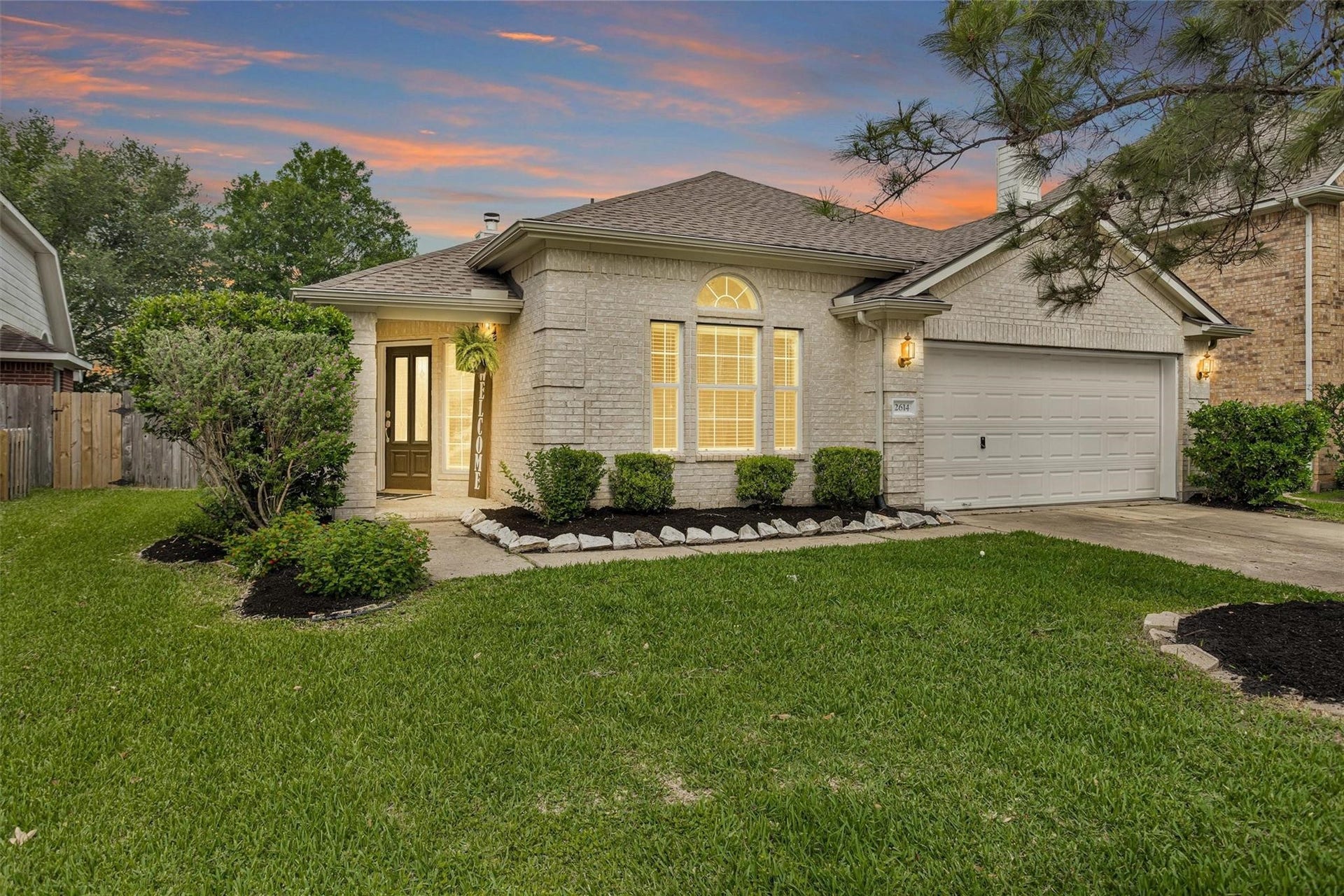 2614 Easton Springs Court, Pearland, TX 77584 Front exterior of the home featuring a well-maintained appearance and welcoming entryway.