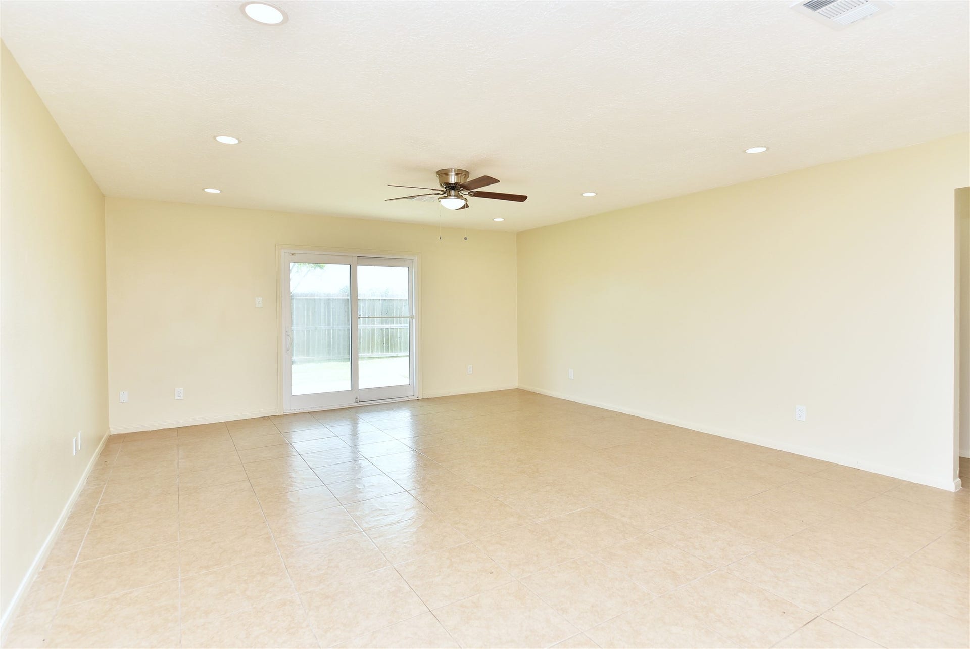 222 Savannah Moss Drive, Richmond, TX 77469 Tile flooring and a ceiling fan.