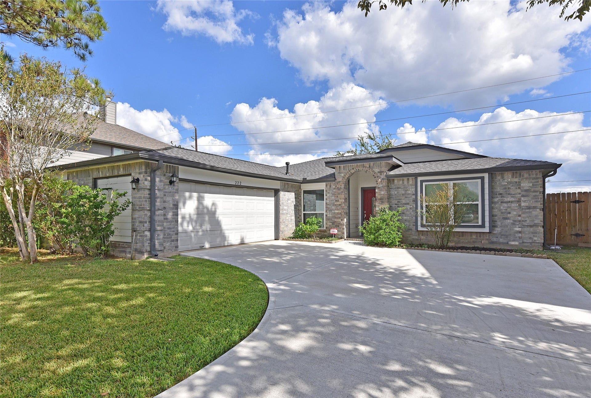 222 Savannah Moss Drive, Richmond, TX 77469 Wide driveway leads to 2 car garage