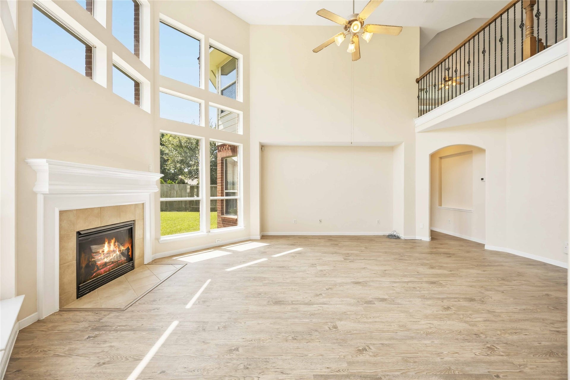 5727 Candlecreek Drive, Richmond, TX 77469 Imagine relaxing by the fireplace with natural light streaming through the wall of windows. The architecture creates an inviting backdrop for both everyday moments and special occasions.