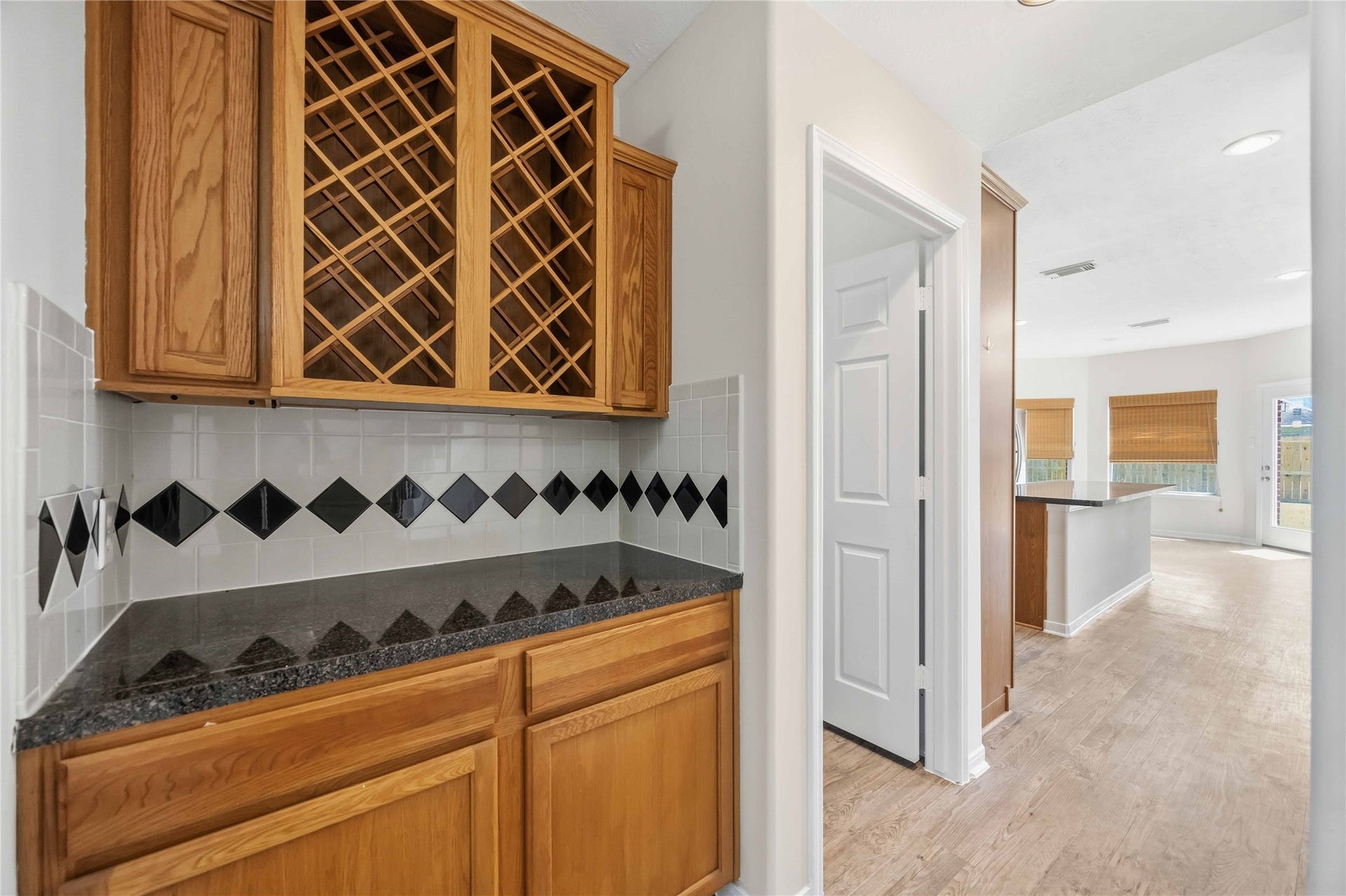 5727 Candlecreek Drive, Richmond, TX 77469 A built-in serving area makes entertaining feel effortless, whether setting up drinks, appetizers or dessert. Extra storage keeps entertaining essentials within easy reach.