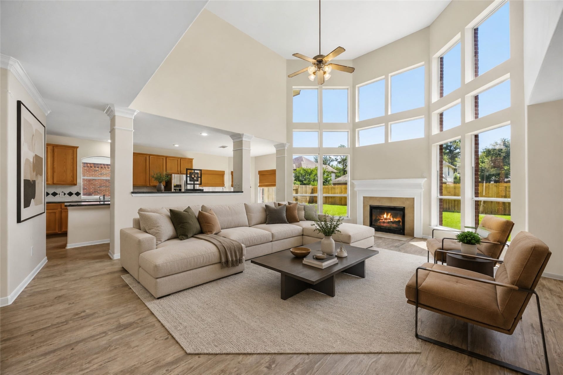 5727 Candlecreek Drive, Richmond, TX 77469 Virtually Staged - Imagine settling into this light-filled living space at the end of the day or gathering here when company comes over. The soaring windows and open design give the room an airy, comfortable feel.