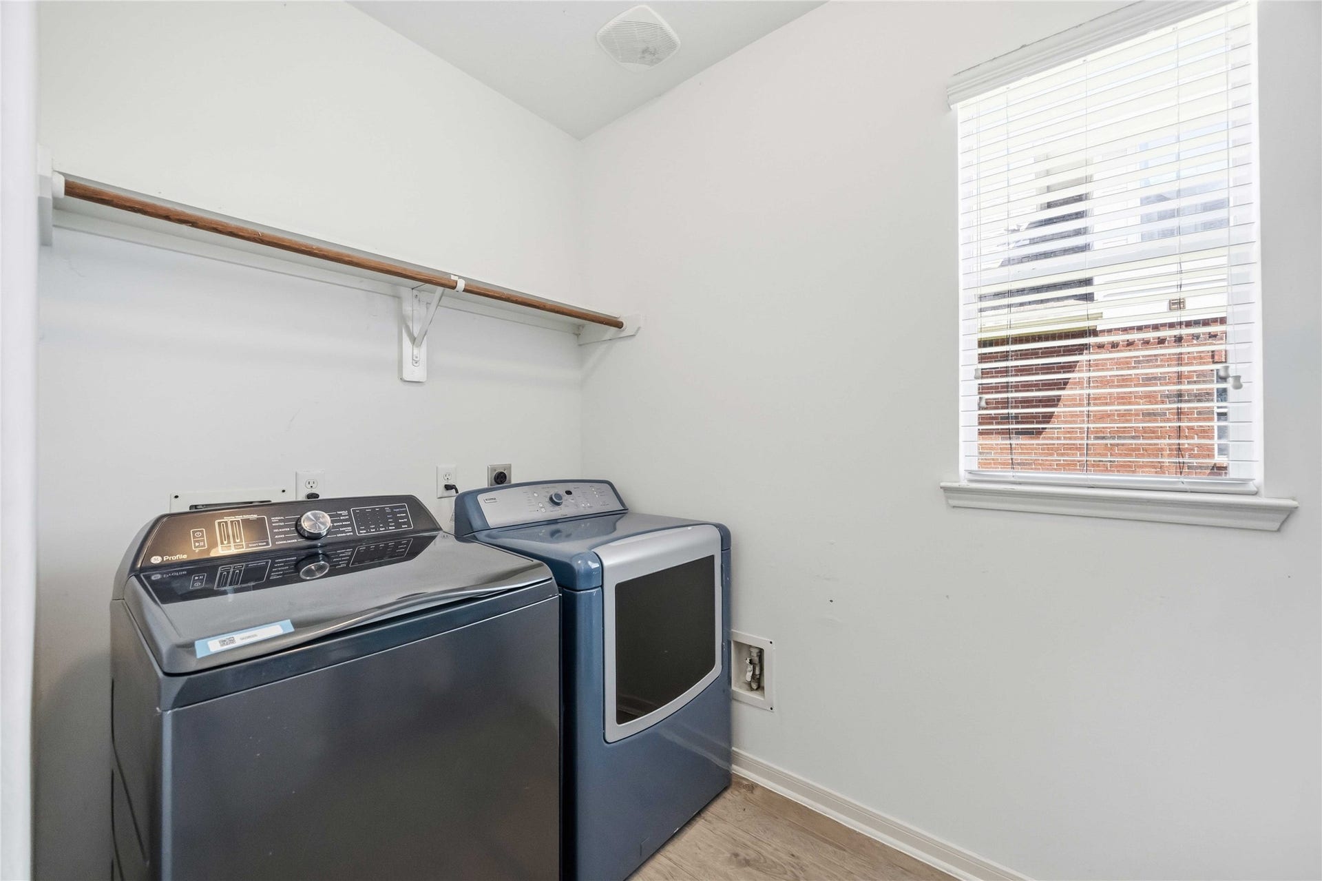 5727 Candlecreek Drive, Richmond, TX 77469 A dedicated laundry room keeps household routines organized and out of the main living areas. Natural light makes even laundry day feel a little brighter.