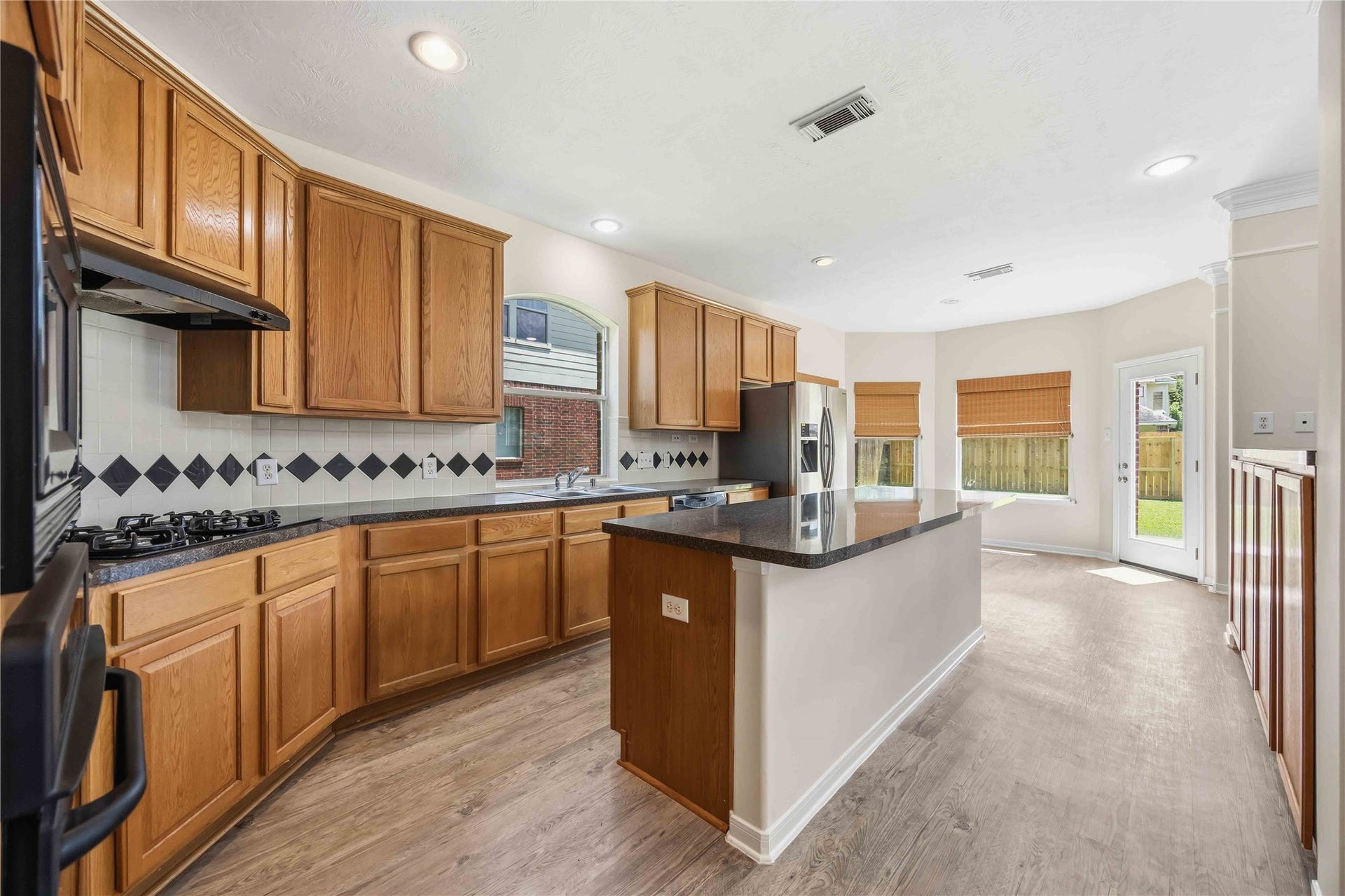 5727 Candlecreek Drive, Richmond, TX 77469 Cooking and entertaining feel easier with plenty of counter space and storage close at hand. The open layout keeps the kitchen connected to everything happening nearby.