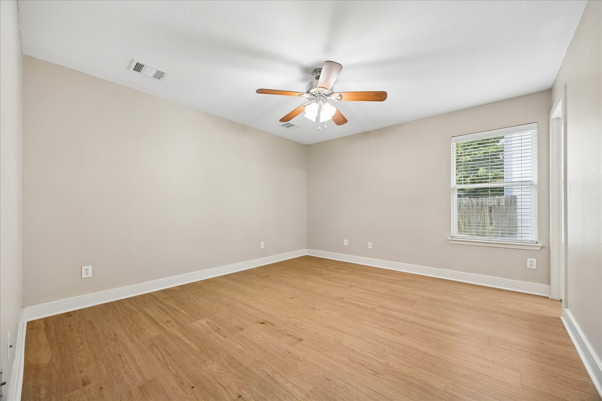 10819 Cobblecreek Way, Missouri City, TX 77459 The roomy primary suite offers fresh neutral paint, updated LVP flooring, a cooling ceiling fan and plenty of space to create a restful retreat. It is the perfect place to begin and end each day.