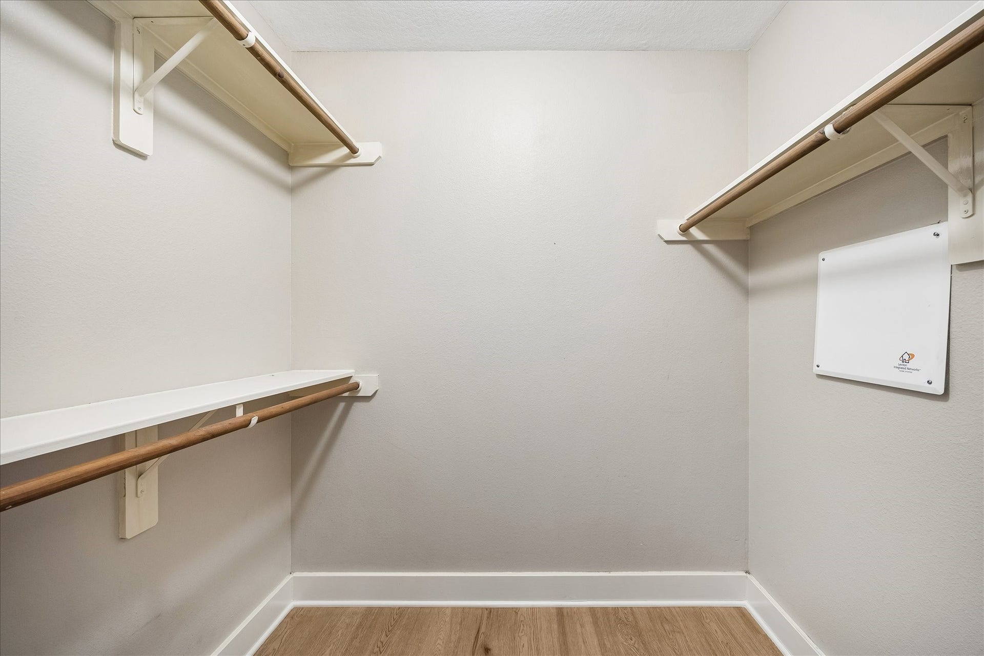 10819 Cobblecreek Way, Missouri City, TX 77459 This deep walk-in closet offers ample hanging space, along with shelving for shoes, bags and accessories.