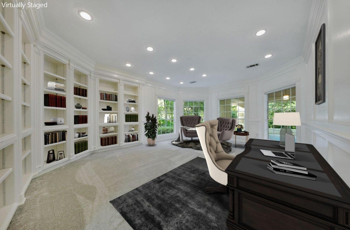 35 W Isle Place, The Woodlands, TX 77381 Private home office with custom built-ins, large windows, and peaceful front yard view