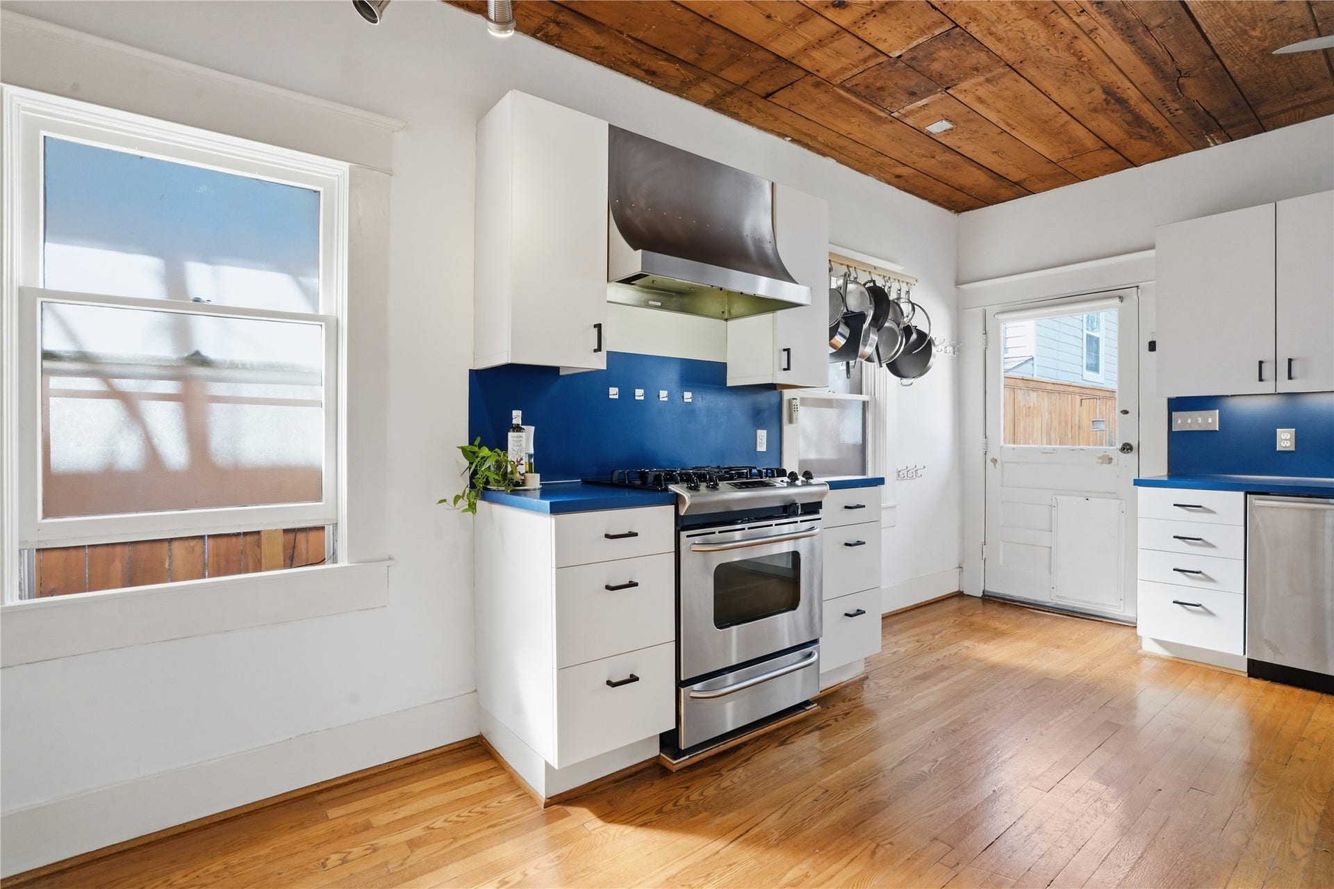 Updated kitchen with stainless steel appliances and gas range.
