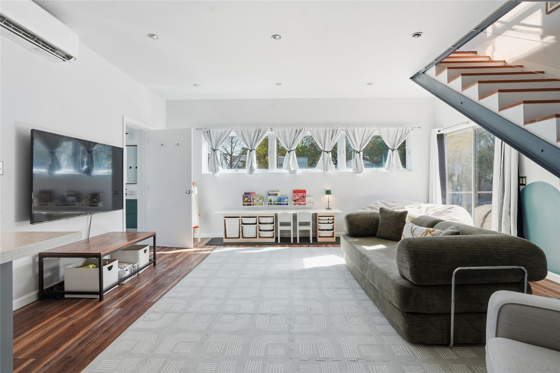 Living area paired with a full bathroom, creating a comfortable and functional set-up.