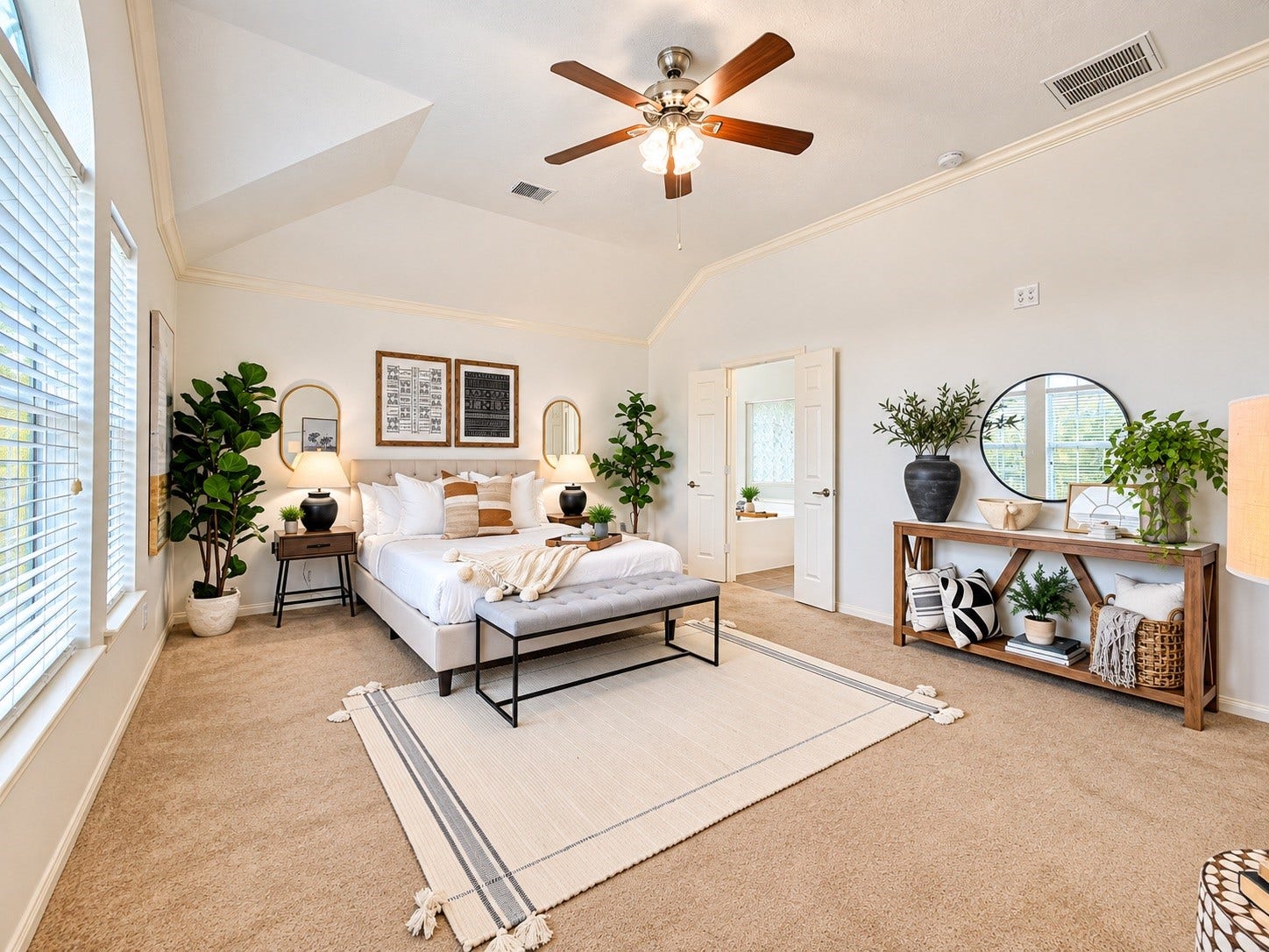 21418 Avalon Queen Drive, Spring, TX 77379 Spacious and serene primary bedroom with abundant natural light and elegant decor.