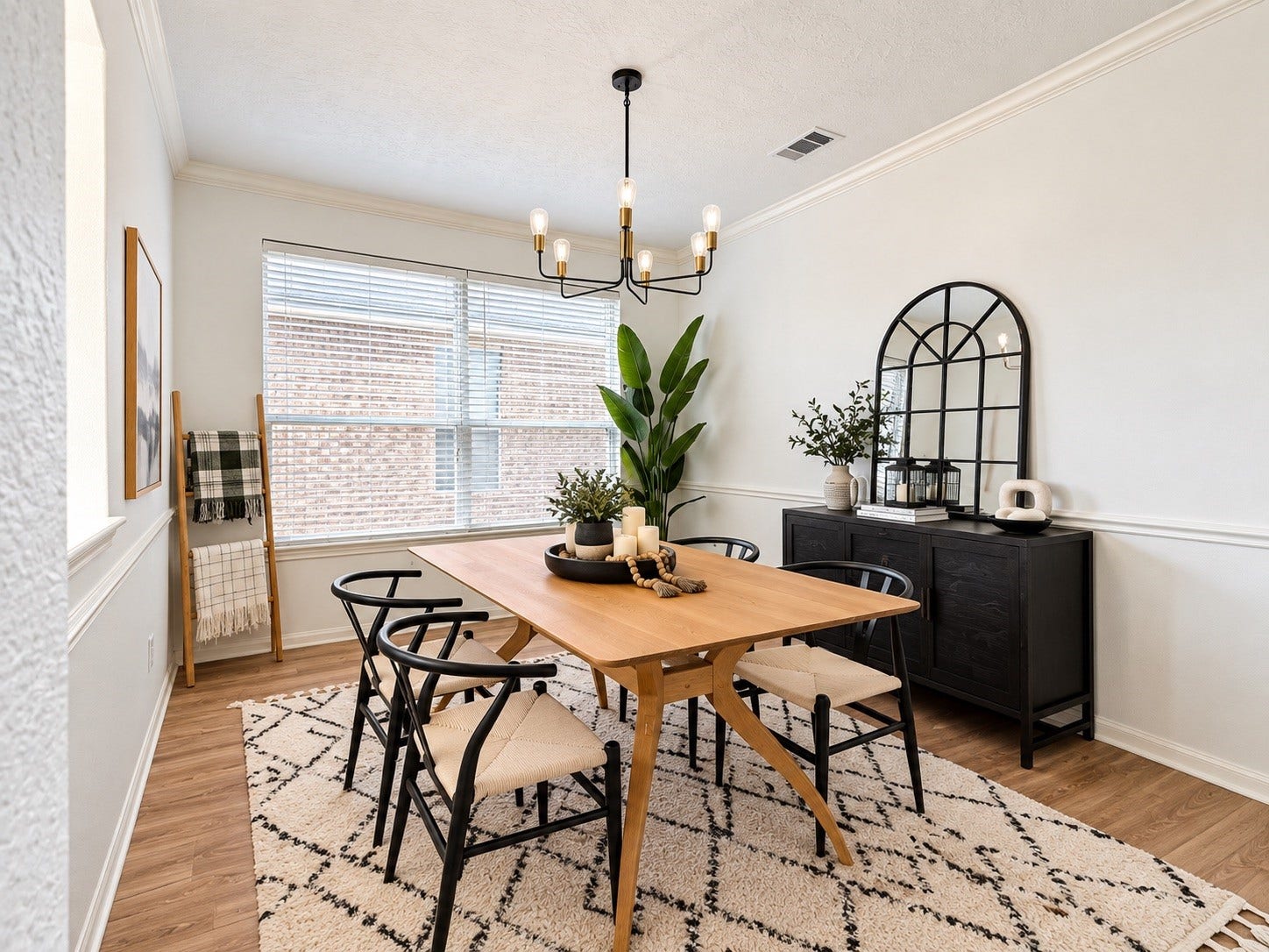 21418 Avalon Queen Drive, Spring, TX 77379 Elegant dining area with abundant natural light, stylish chandelier, and chic accents for a perfect gathering space.