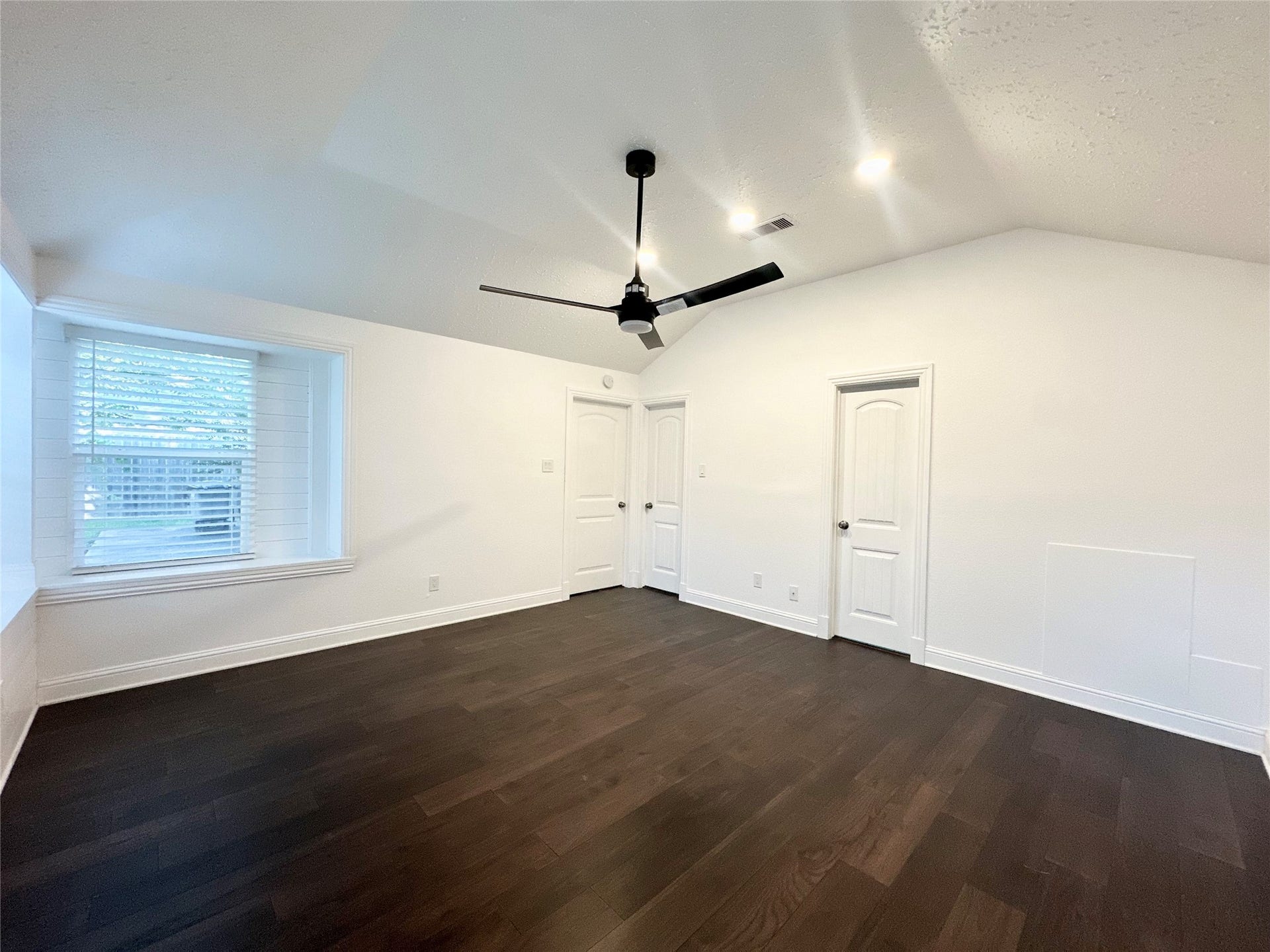 3411 Cannon Ridge Drive, Richmond, TX 77406 Bright bathroom featuring a spacious walk-in shower and a luxurious soaking tub, accented by elegant tilework and a large window for natural light.