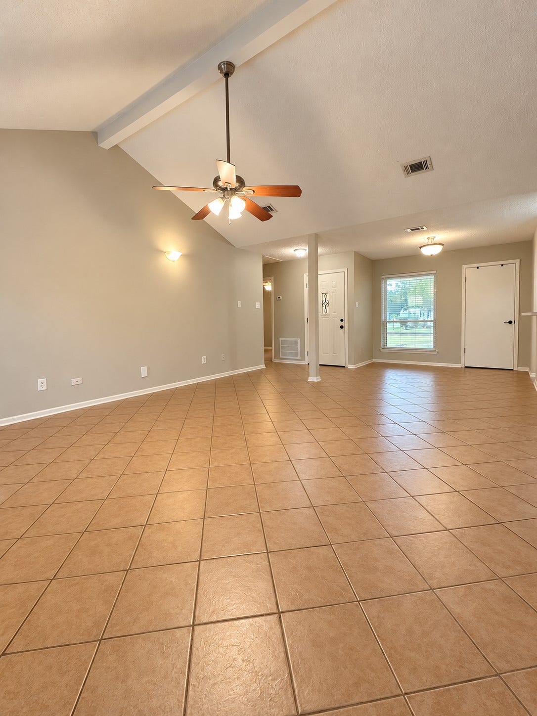 26415 Pine Canyon Drive, Spring, TX 77380 View from back of living room looking at front door (left) and pantry (right)