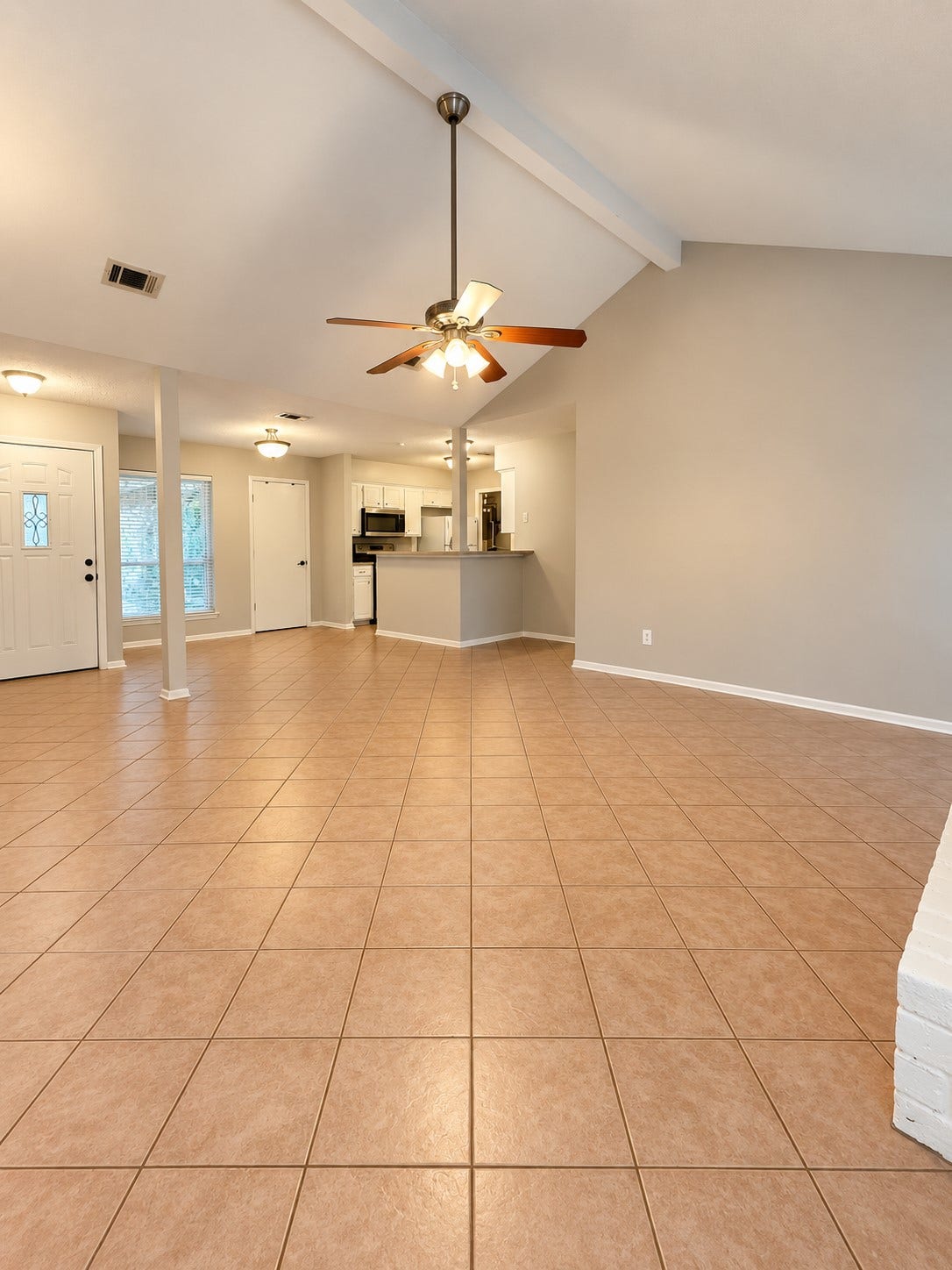 26415 Pine Canyon Drive, Spring, TX 77380 Looking from back of living room by back door to kitchen area