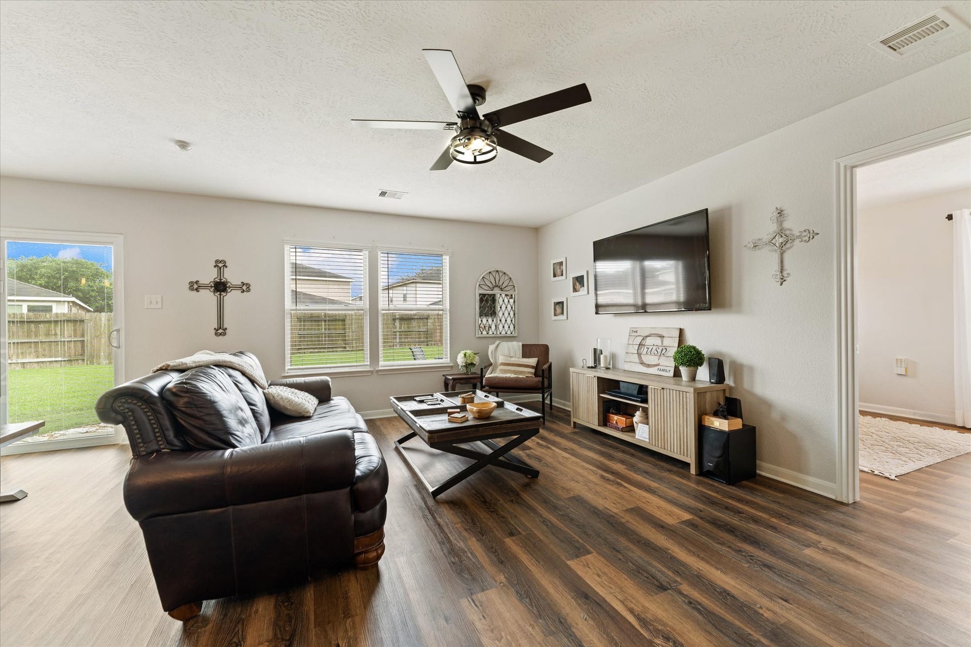 15903 Arapaho Bend Lane, Cypress, TX 77429 Family room with wall of windows for natural light