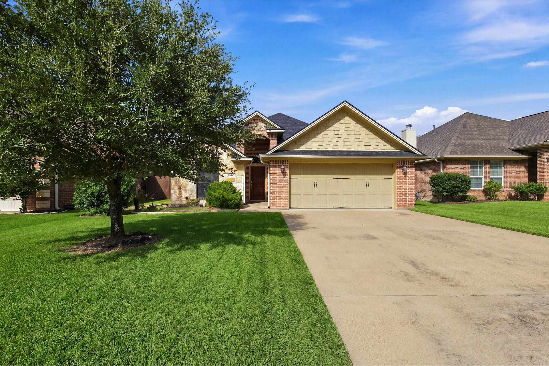 4267 Hollow Stone Drive, College Station, TX 77845 The grass has been digitally enhanced.