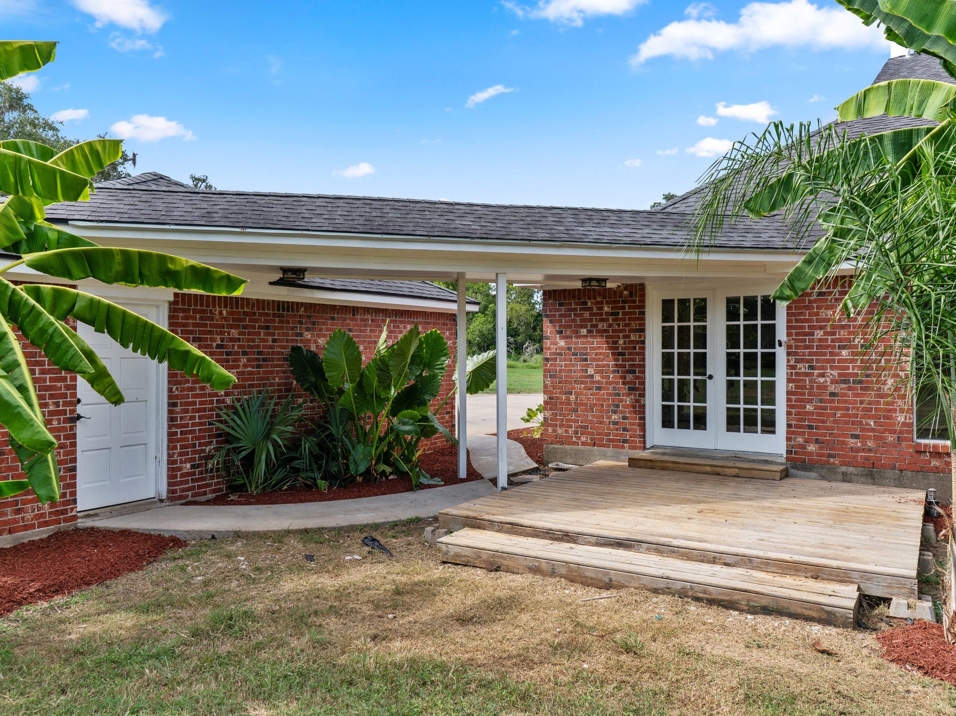back patio that leads to your oversized garage