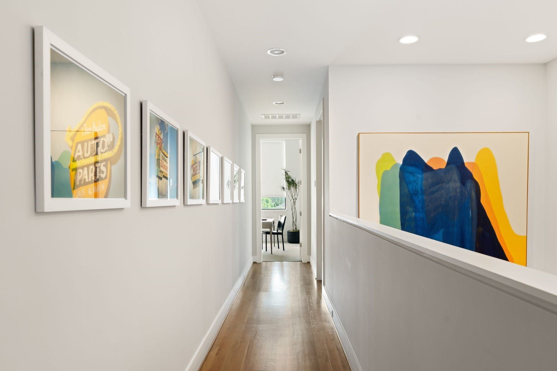 2622 Greenbriar Drive, Houston, TX 77098 Architectural third-floor hallway connects the primary suite, secondary en suite bedroom, and conveniently located utility room while providing additional space to display art.