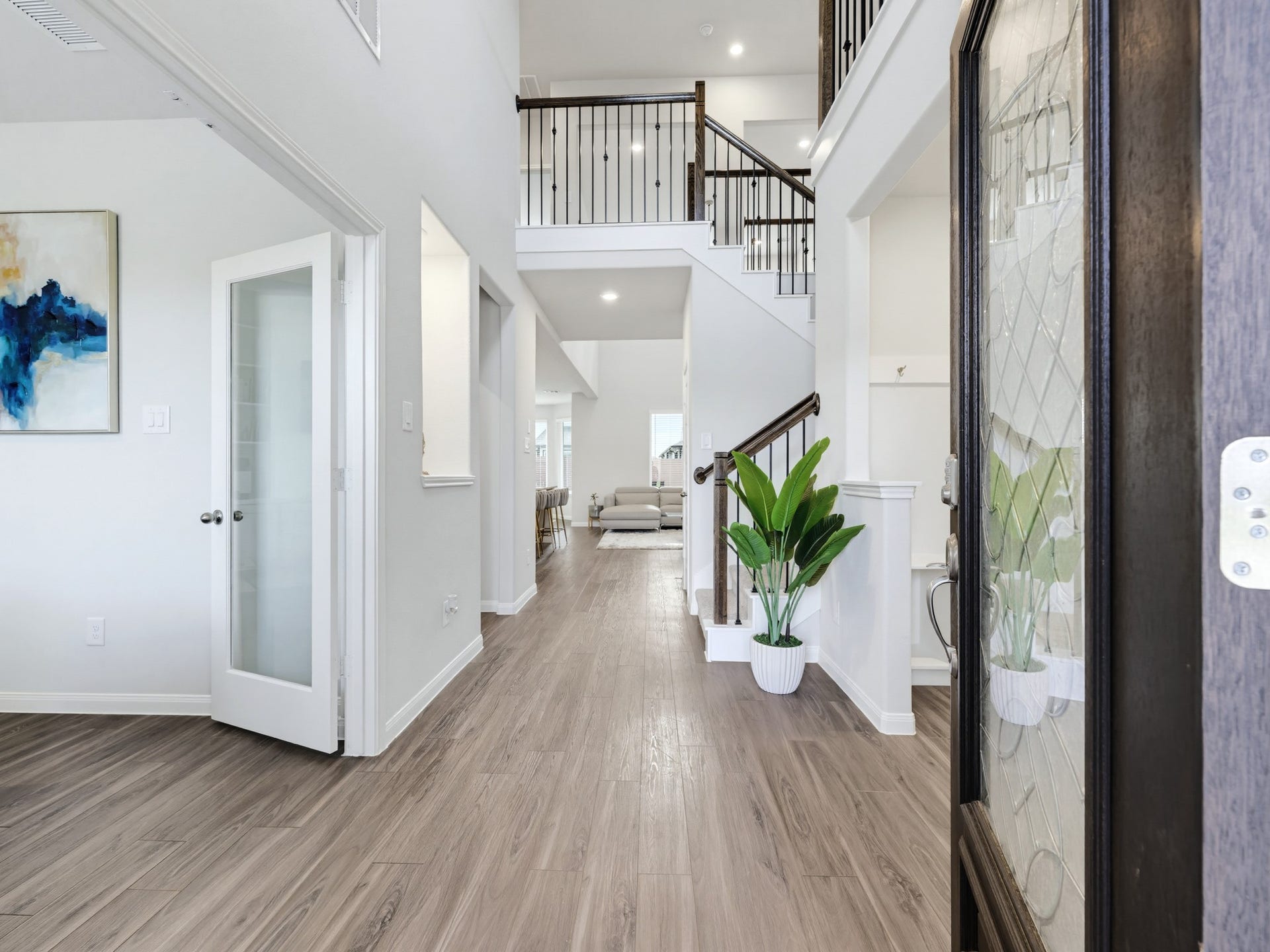 Beautiful entrance with high ceilings, and the office is by the entrance.