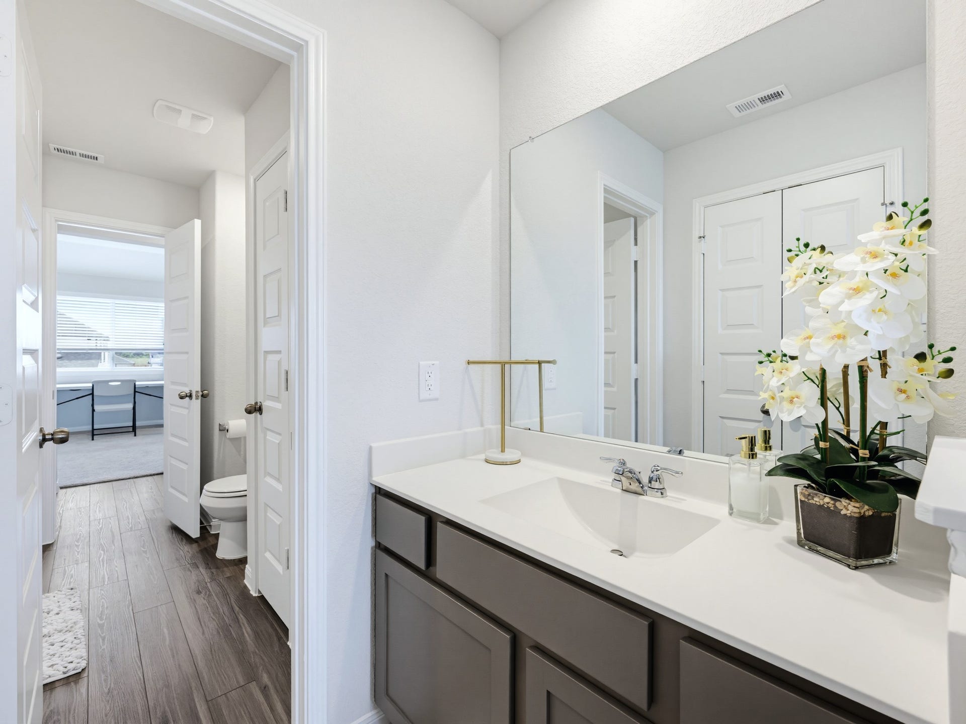 The third bathroom features a Jack and Jill design with direct access on the third bedroom, and the fourth bedroom.