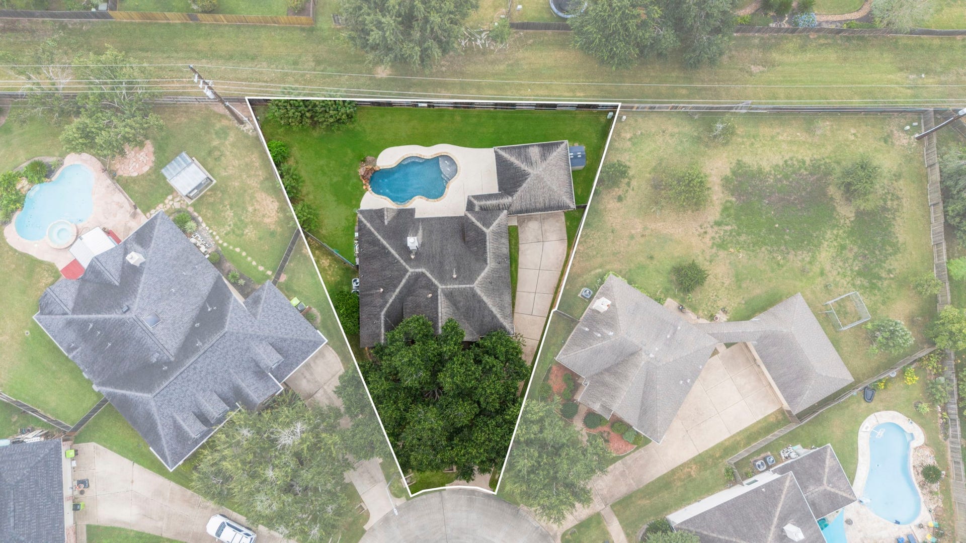 9730 Harrison Lane, Missouri City, TX 77459 Aerial property boundary outline showing the expansive oversized cul-de-sac lot, large private back yard with in-ground pool, detached garage layout, and mature front shade trees.