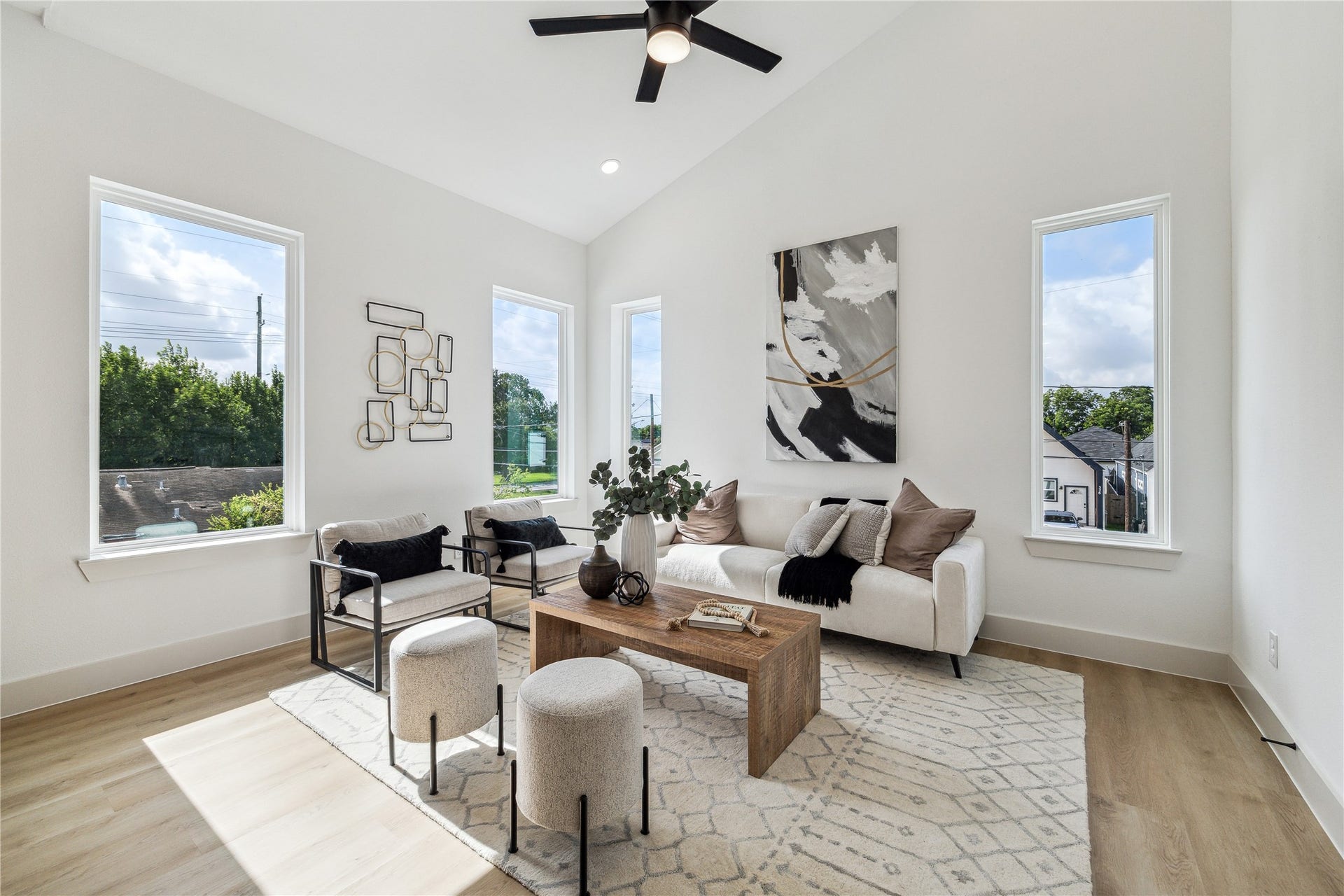 4415 Buck Street, #A/B, Houston, TX 77020 Open concept living area featuring abundant natural light, modern finishes, and a spacious layout designed for entertaining.