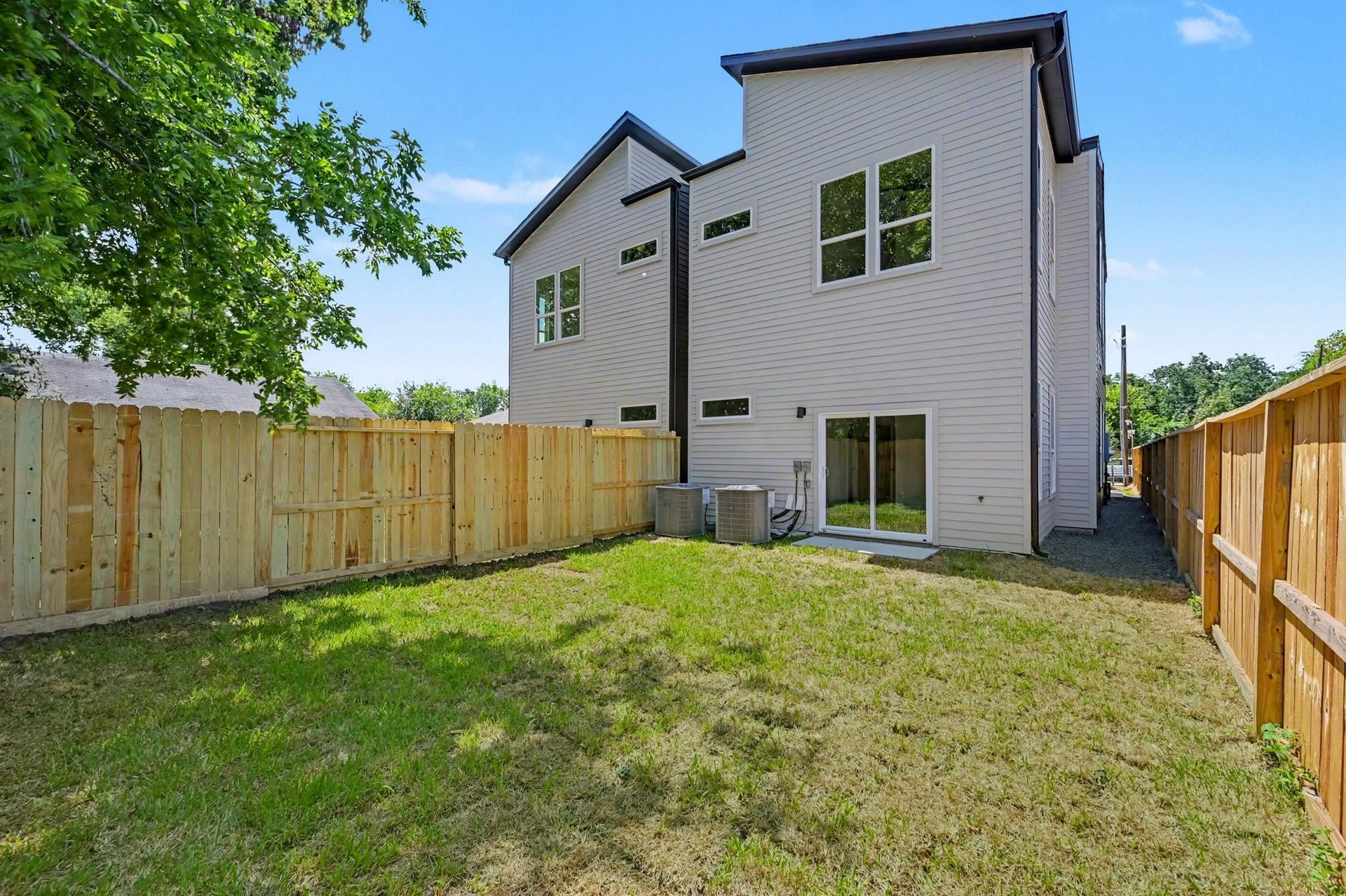 4415 Buck Street, #A/B, Houston, TX 77020 Spacious backyard offering plenty of room for outdoor entertaining , pets, play or creating your own priavte retreat.