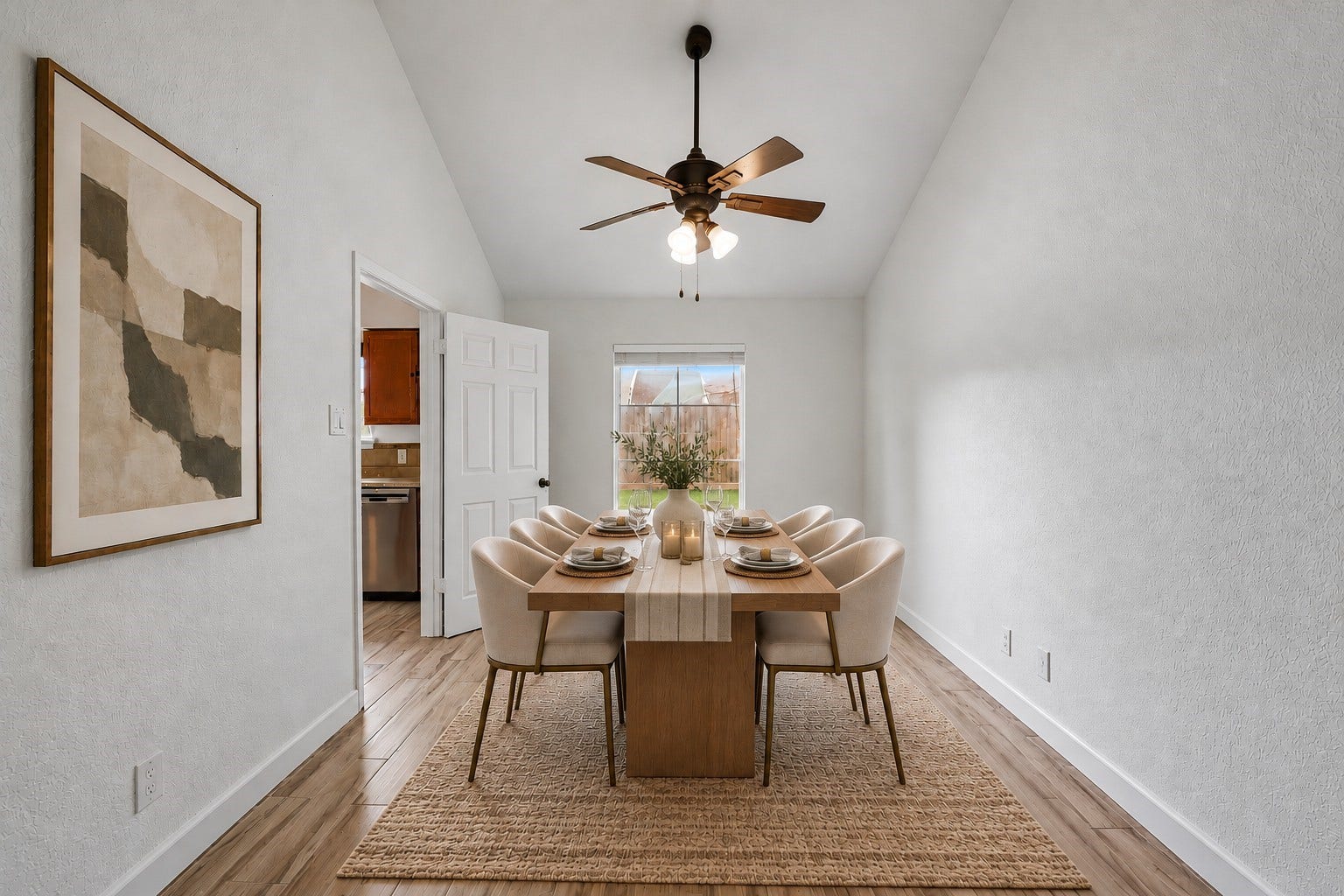 22711 Provincial Boulevard, Katy, TX 77450 Virtually Staged: Dramatic vaulted ceilings elevate this dedicated formal dining room, creating an open and welcoming ambiance tailored for hosting memorable dinners.