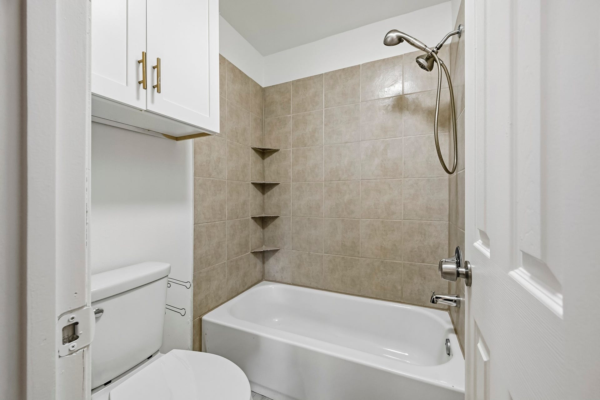22711 Provincial Boulevard, Katy, TX 77450 Paired with upgraded plumbing hardware and a spacious upper vanity cabinet for extra linens and essentials, the room delivers a welcoming, practical setting to unwind.