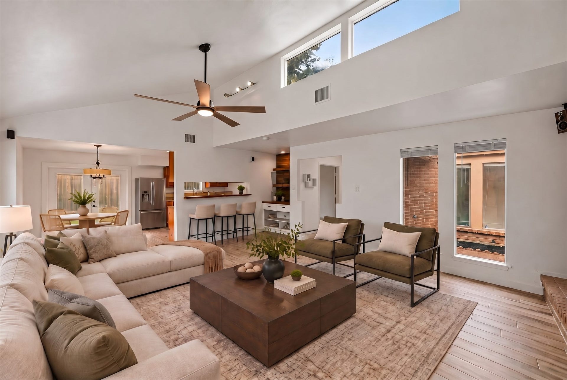 22711 Provincial Boulevard, Katy, TX 77450 Virtually Staged: Designed for warmth and effortless hospitality, this spacious great room blends architectural character with modern comfort.
