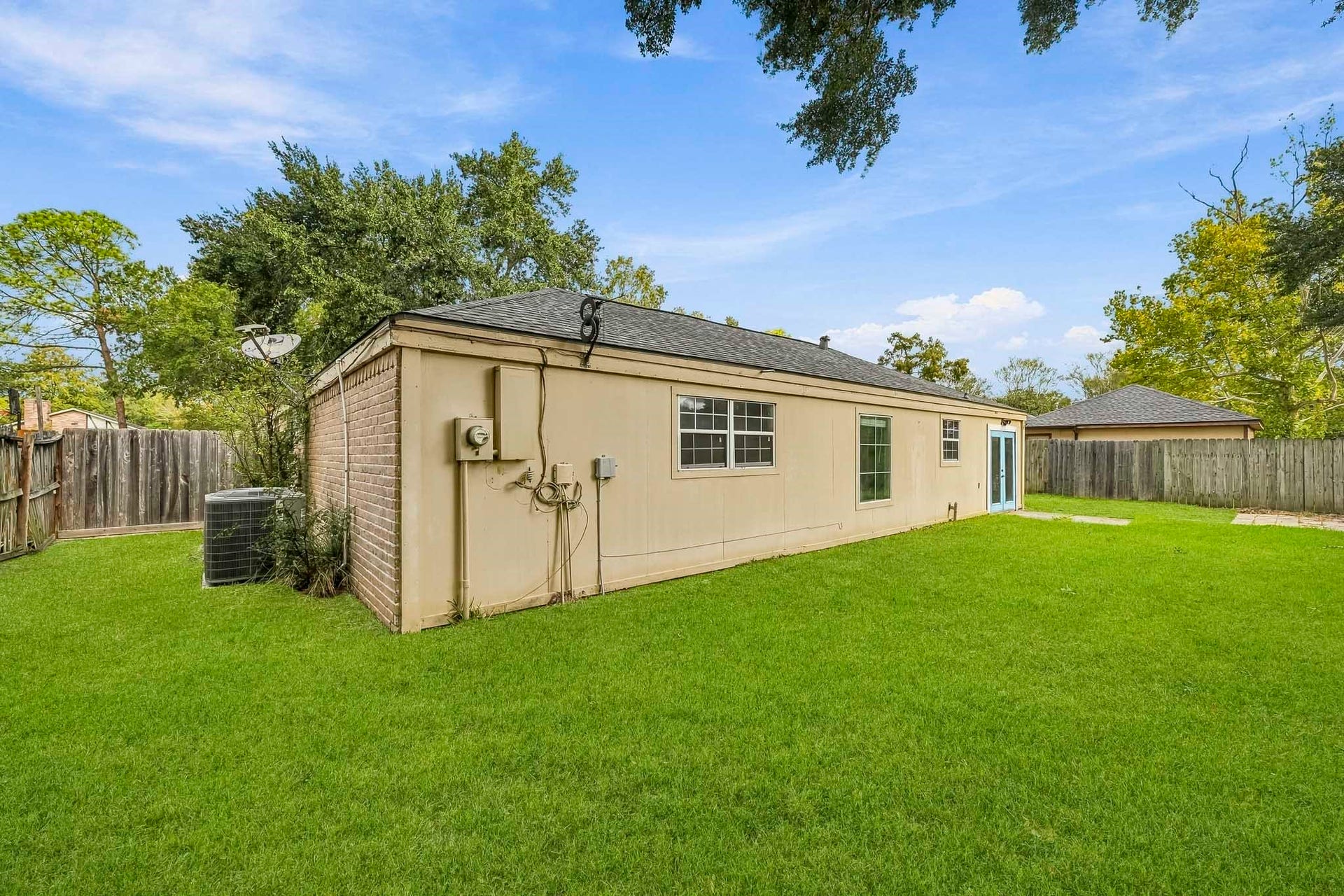 22711 Provincial Boulevard, Katy, TX 77450 With its sturdy construction, single-level design, and substantial side and rear acreage, the property creates a warm and versatile open-air retreat.