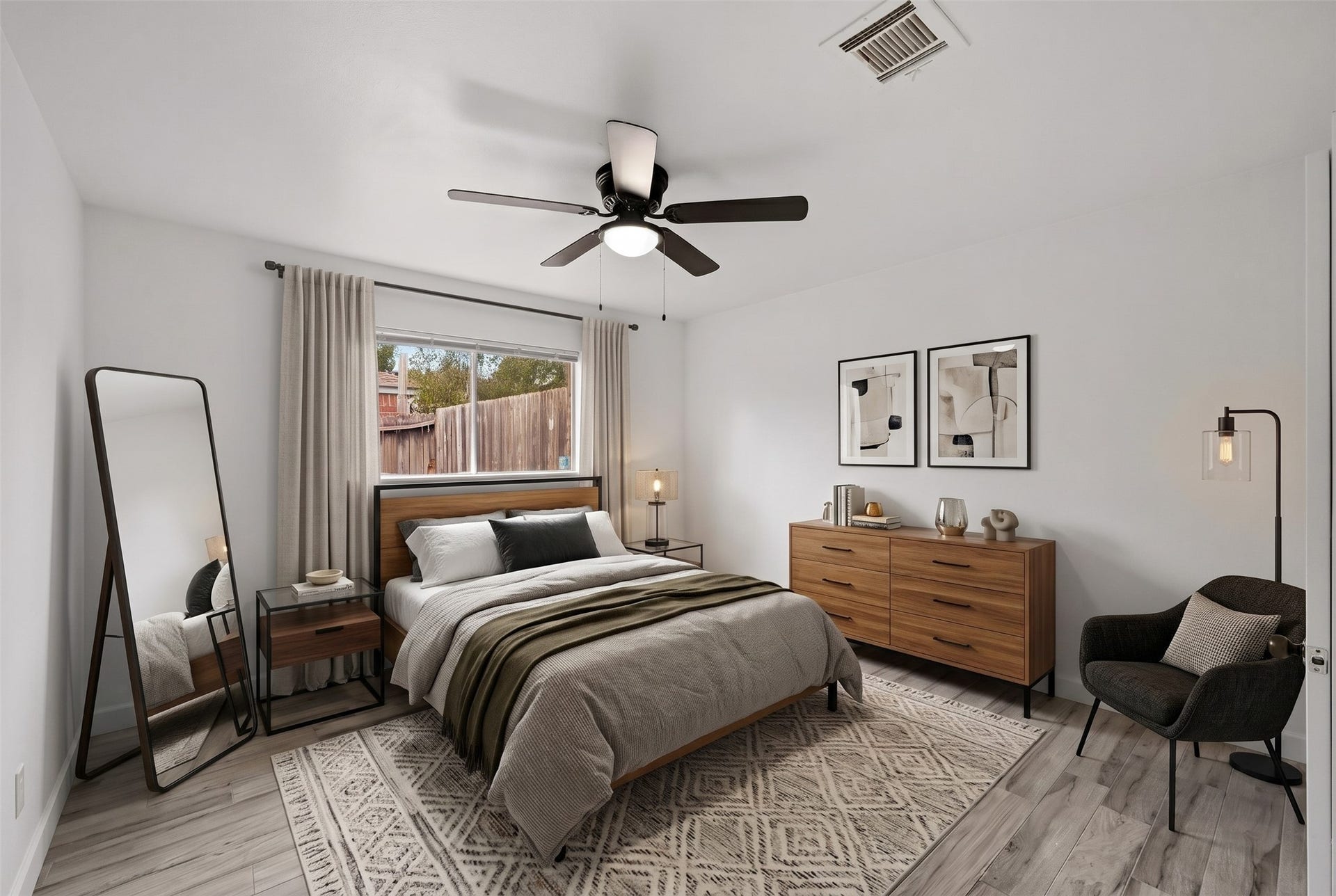 22711 Provincial Boulevard, Katy, TX 77450 Virtually Staged: This comfortable secondary bedroom offers a generous, well-balanced footprint designed for restful relaxation and everyday versatility