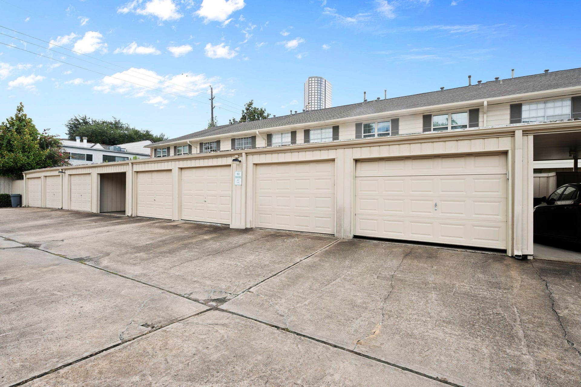 5819 Valley Forge Drive, #91, Houston, TX 77057 Spacious and convenient multiple-car garage area, ideal for secure vehicle storage, situated in a well-maintained residential complex.