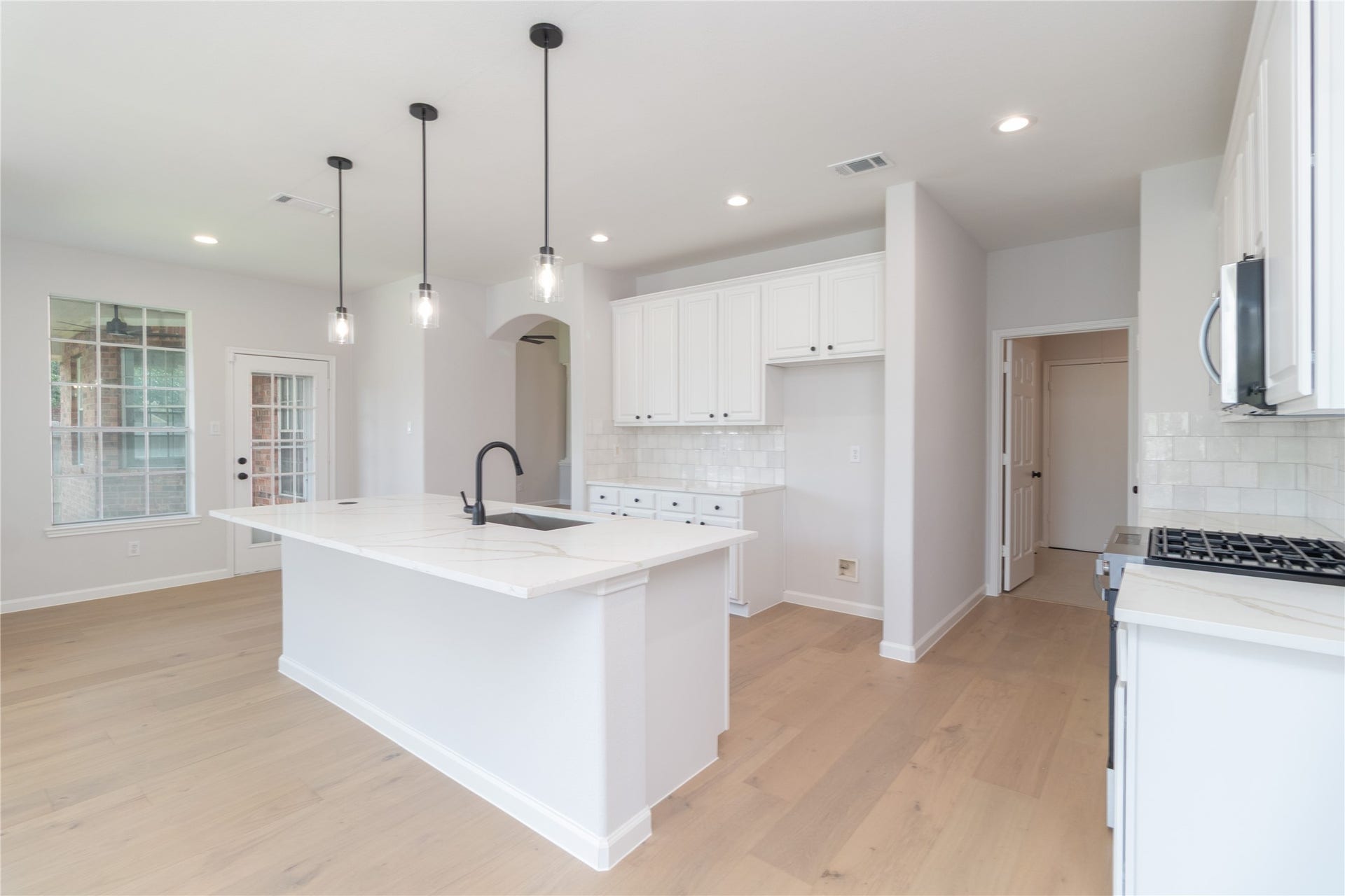 3115 Hickory Grove Lane, Pearland, TX 77584 Another angle of the updated kitchen, offering a clean, modern look.